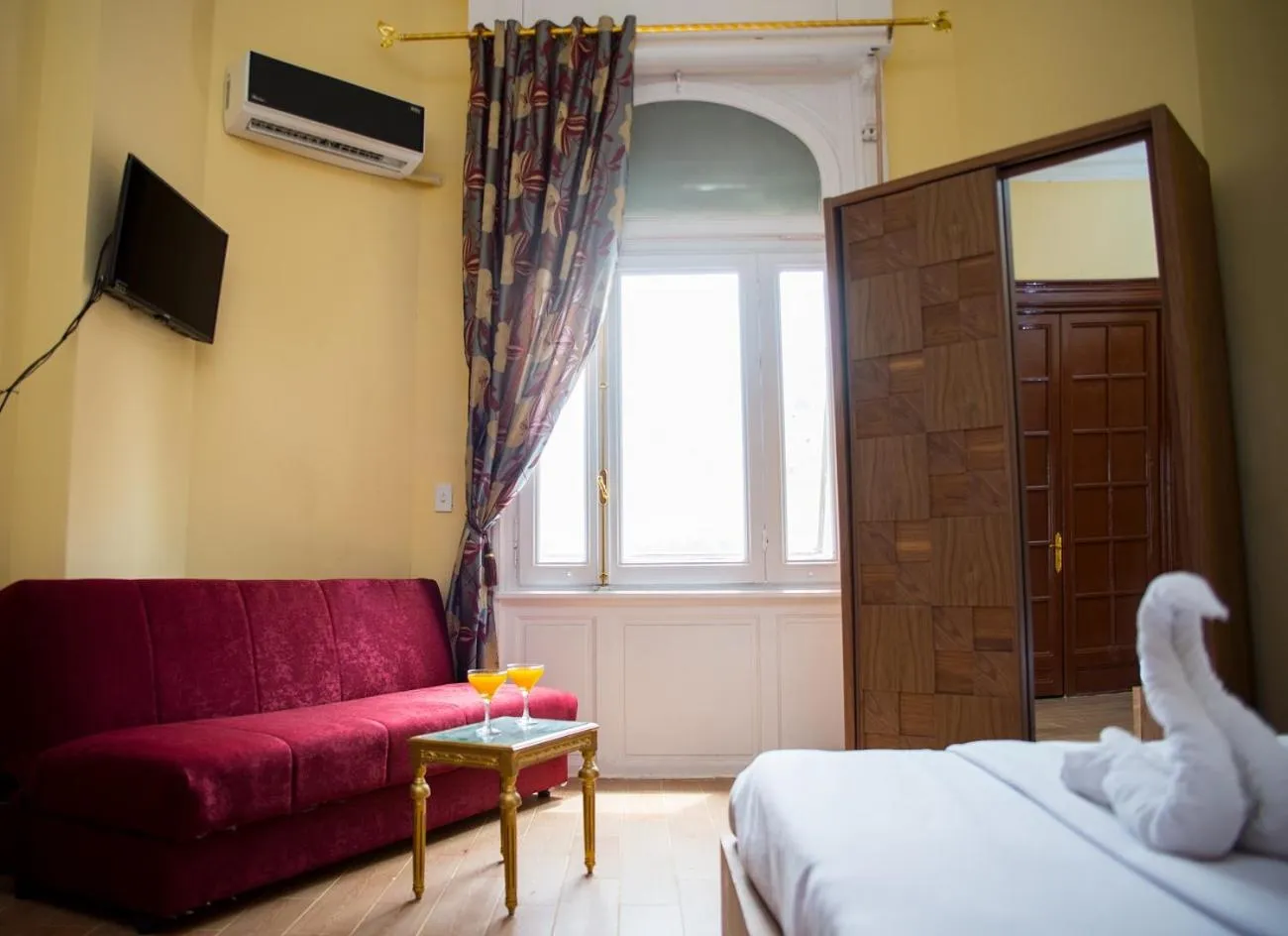 Bed in New Grand Royal Hotel Cairo