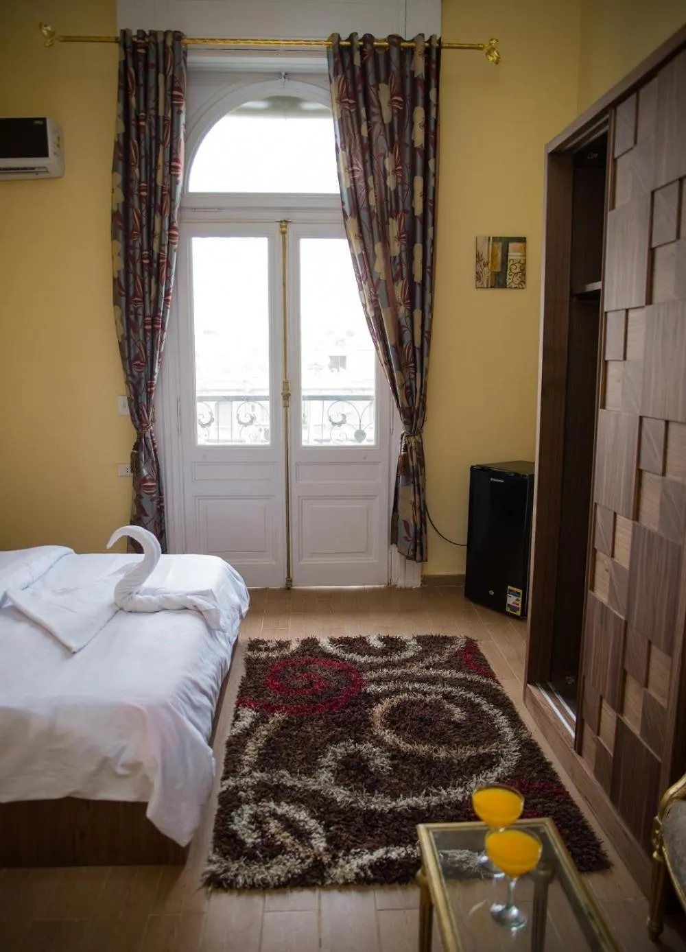 Bed in New Grand Royal Hotel Cairo