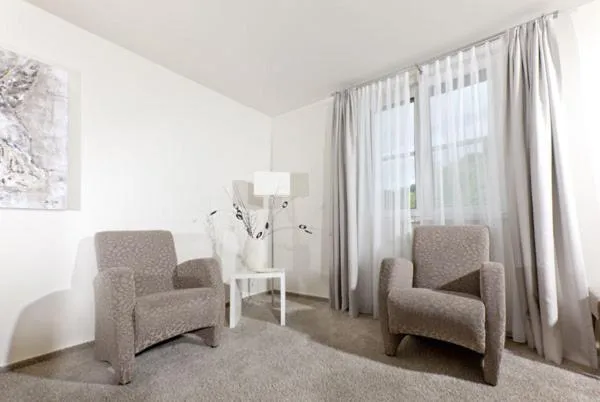 Seating area in Restaurant Niedmühle Land & Genuss Hotel