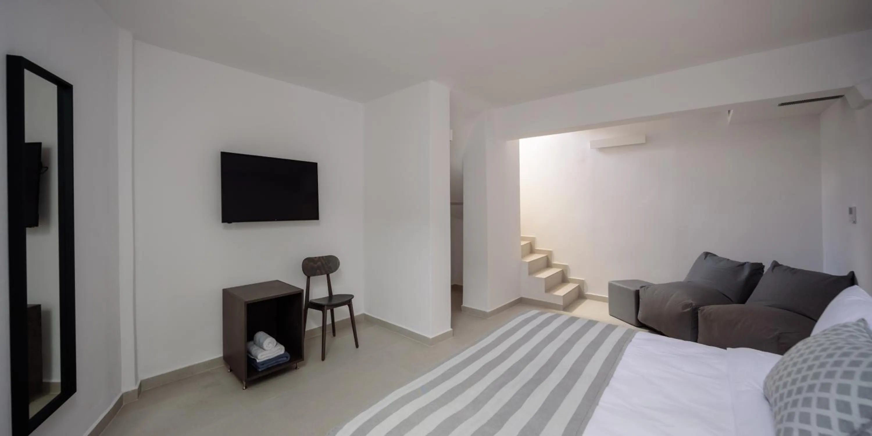 Bed in Kalestesia Suites