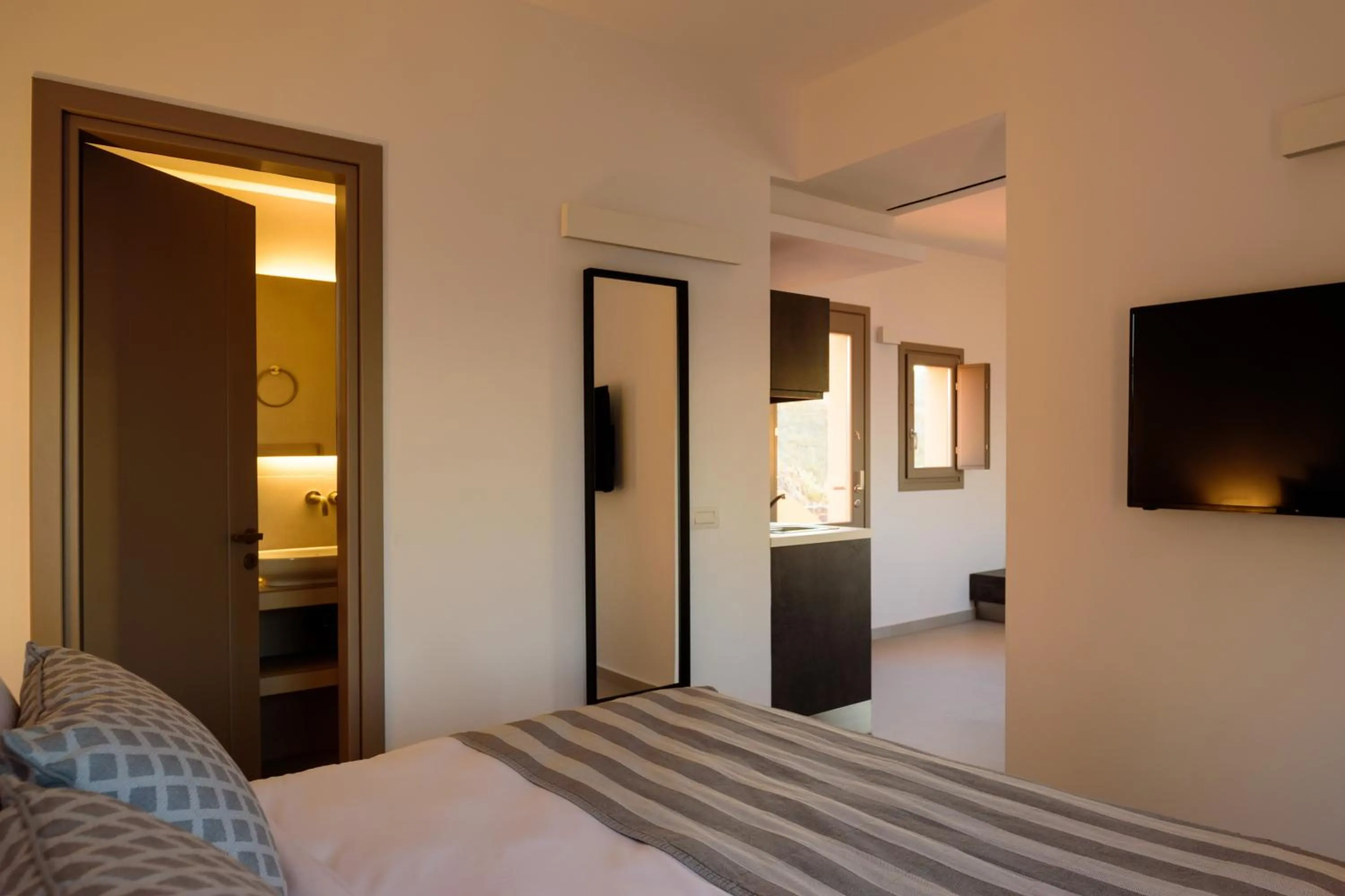 Bed in Kalestesia Suites