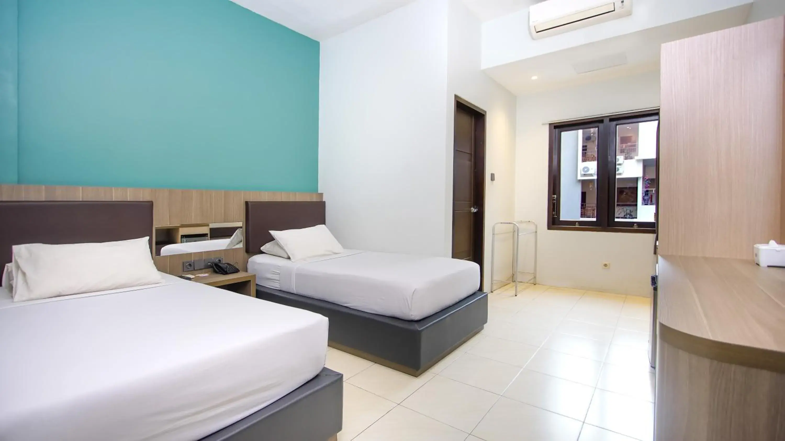 Deluxe Twin Room in Sun In Pangandaran Hotel Deluxe Twin Room in Sun In Pangandaran Hotel