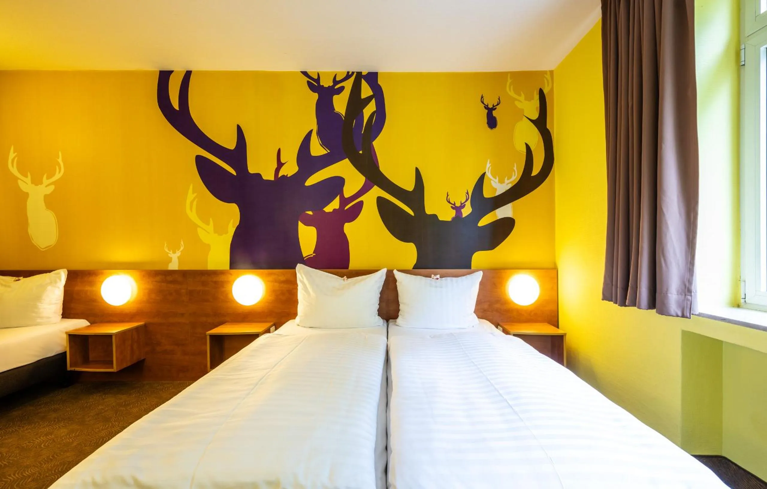 Photo of the whole room, Bed in Hotel Göttingen-West