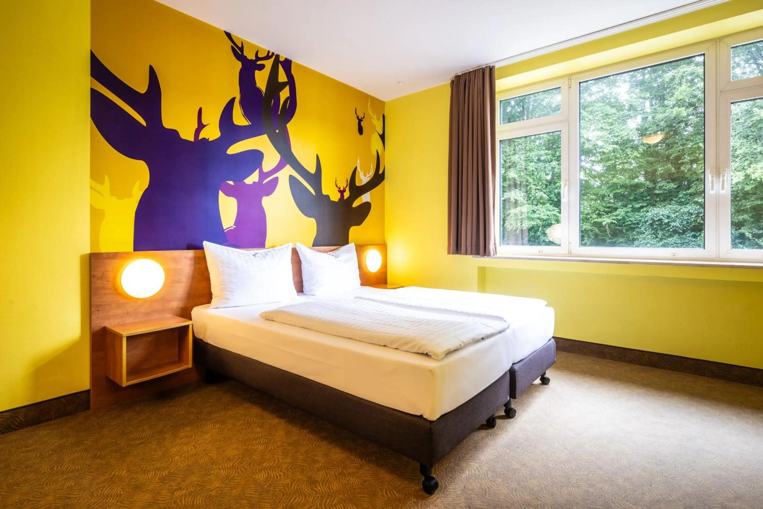 Photo of the whole room, Bed in Hotel Göttingen-West
