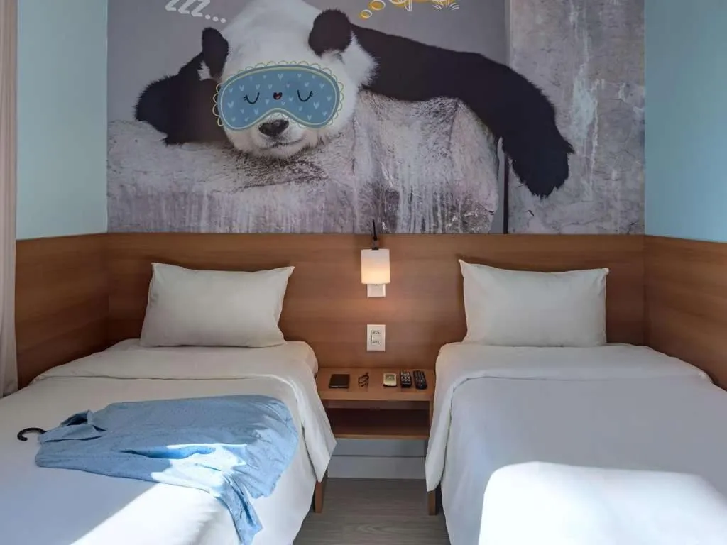 Bed in Golden Tower Maurilio Biagi by Fênix Hotéis