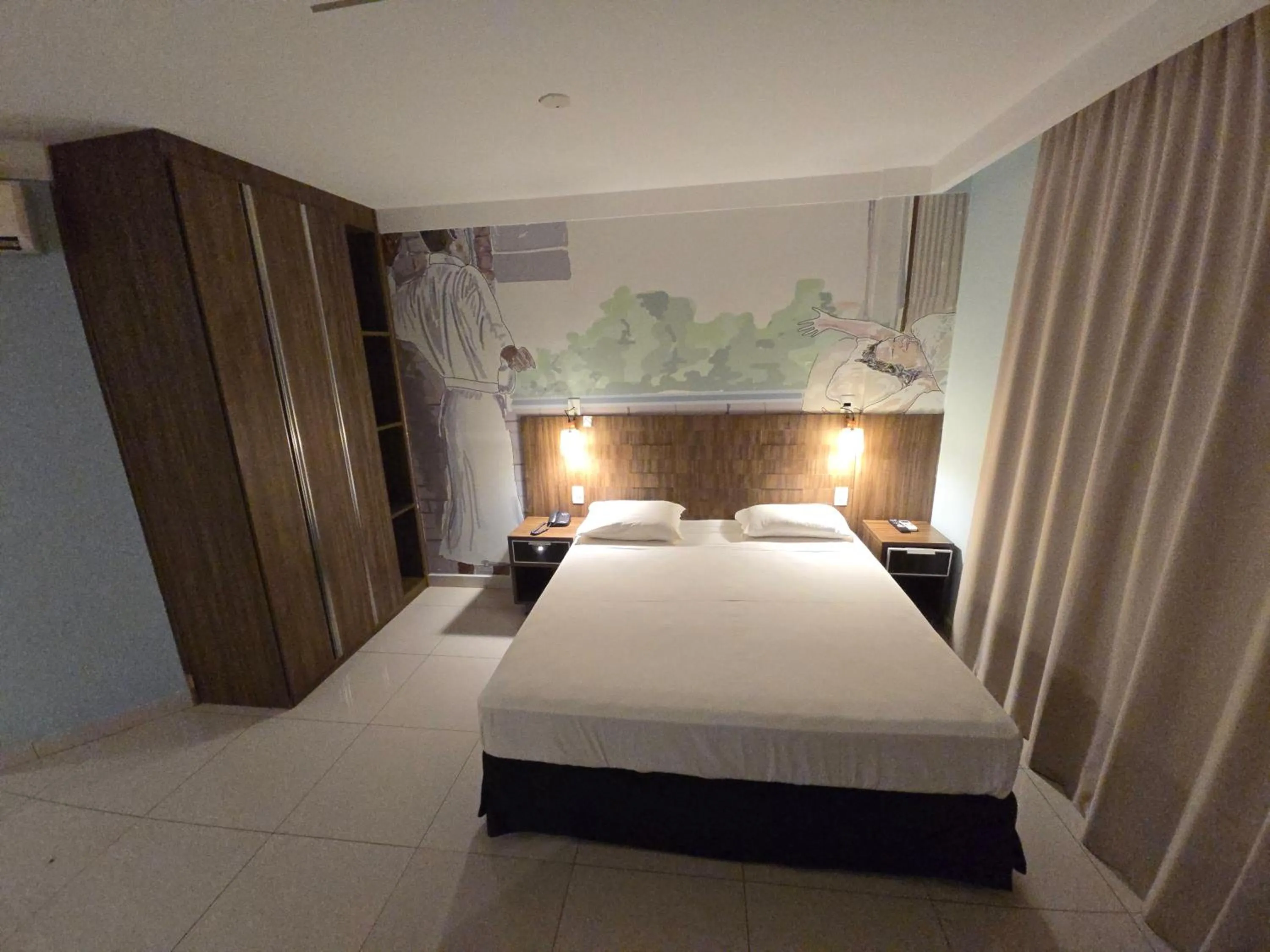 Bed in Golden Tower Maurilio Biagi by Fênix Hotéis