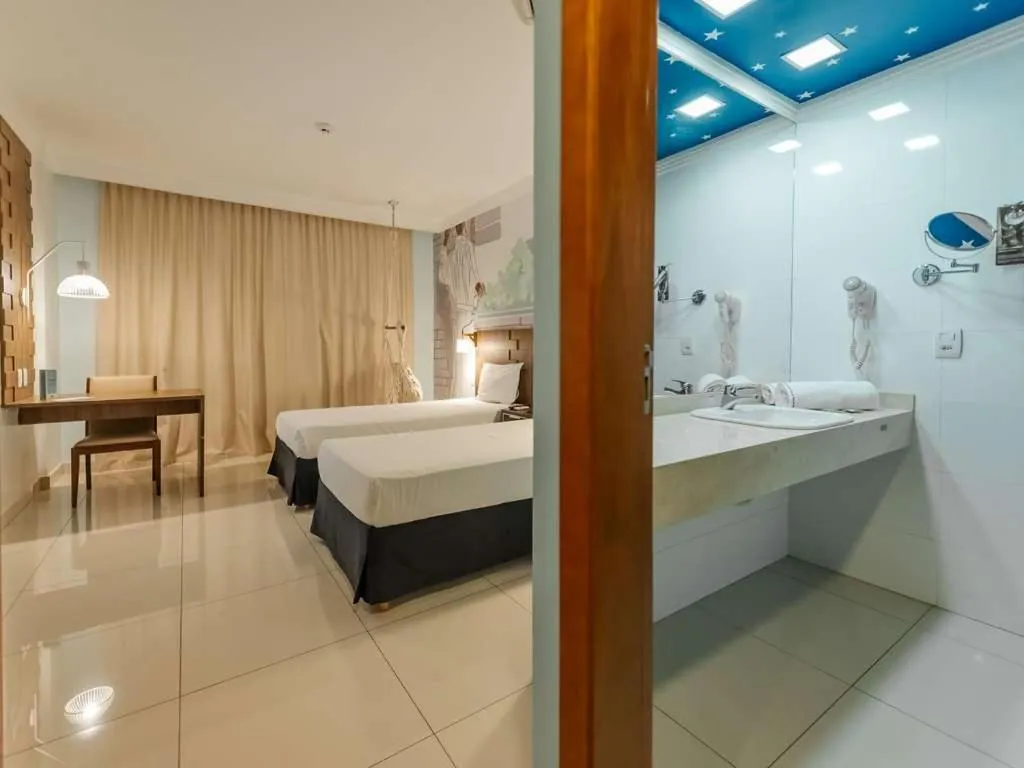 Bed in Golden Tower Maurilio Biagi by Fênix Hotéis