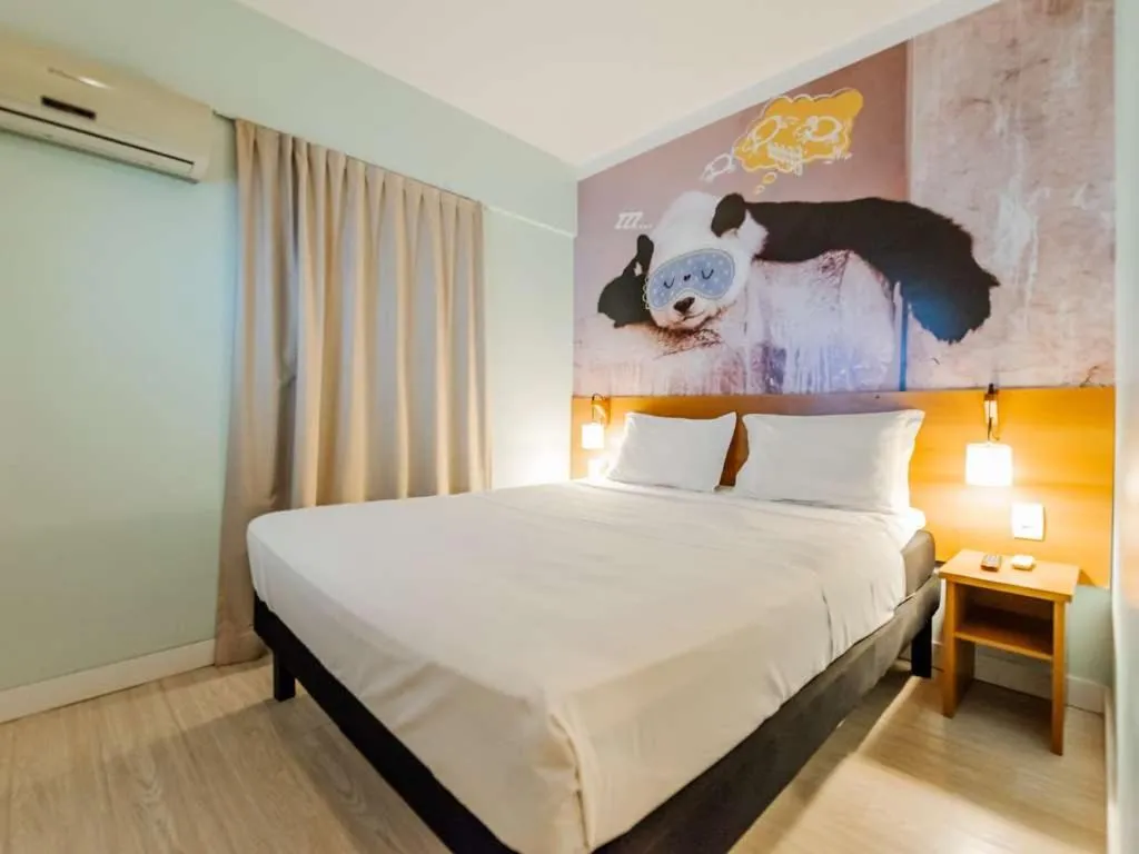 Bed in Golden Tower Maurilio Biagi by Fênix Hotéis