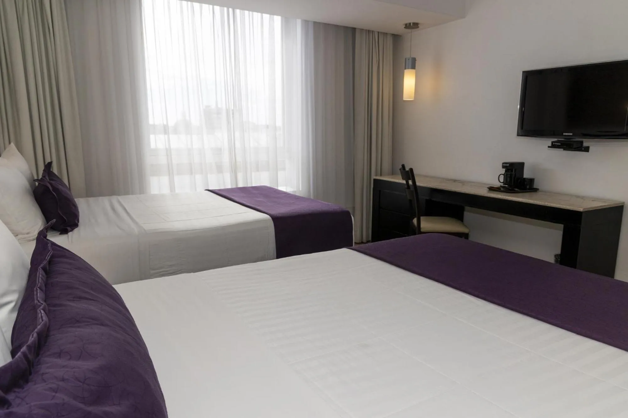 Bed in Gamma Puebla Señorial Centro