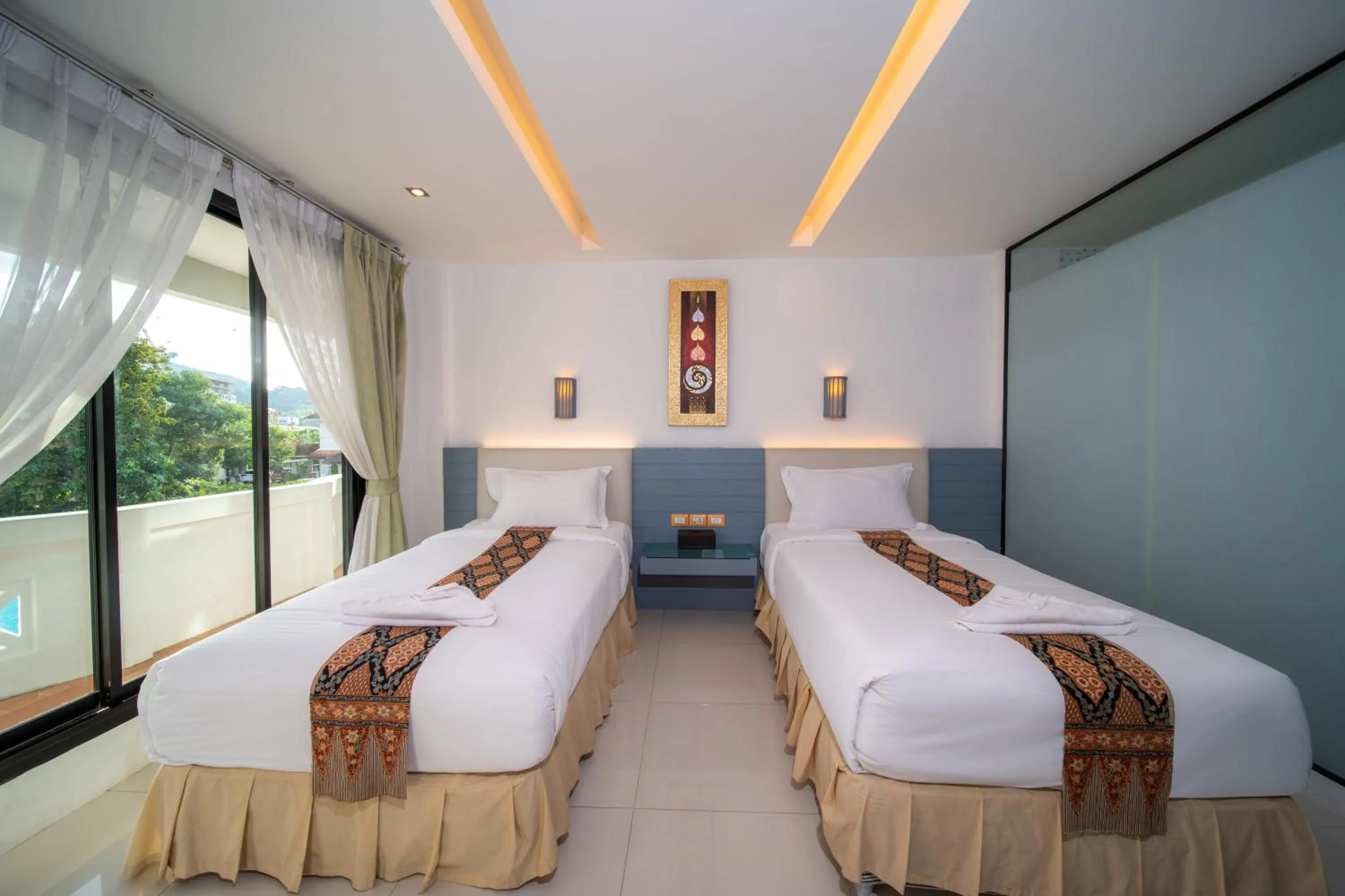 Bed in Blue Carina Hotel Phuket