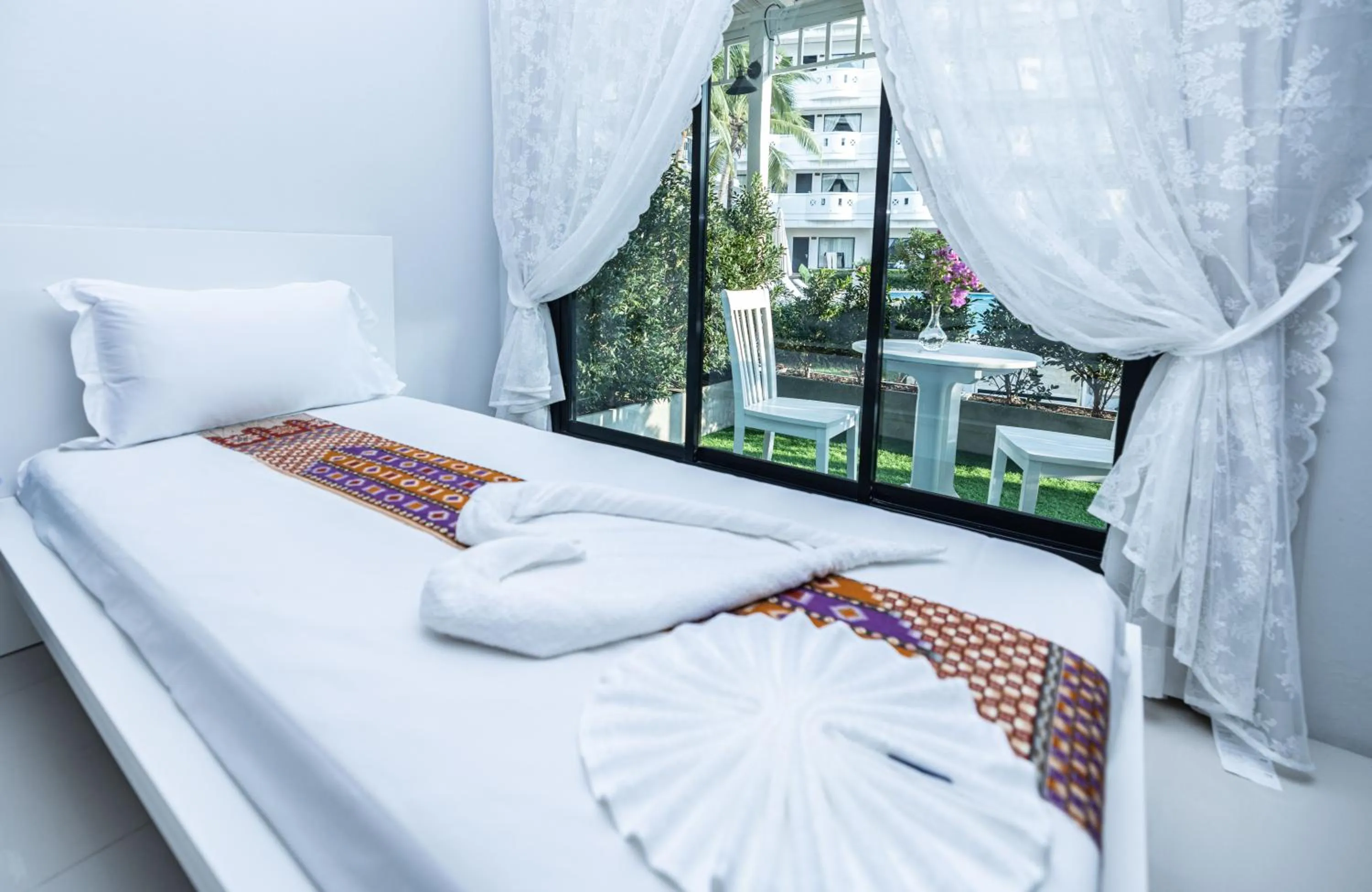 Bed in Blue Carina Hotel Phuket