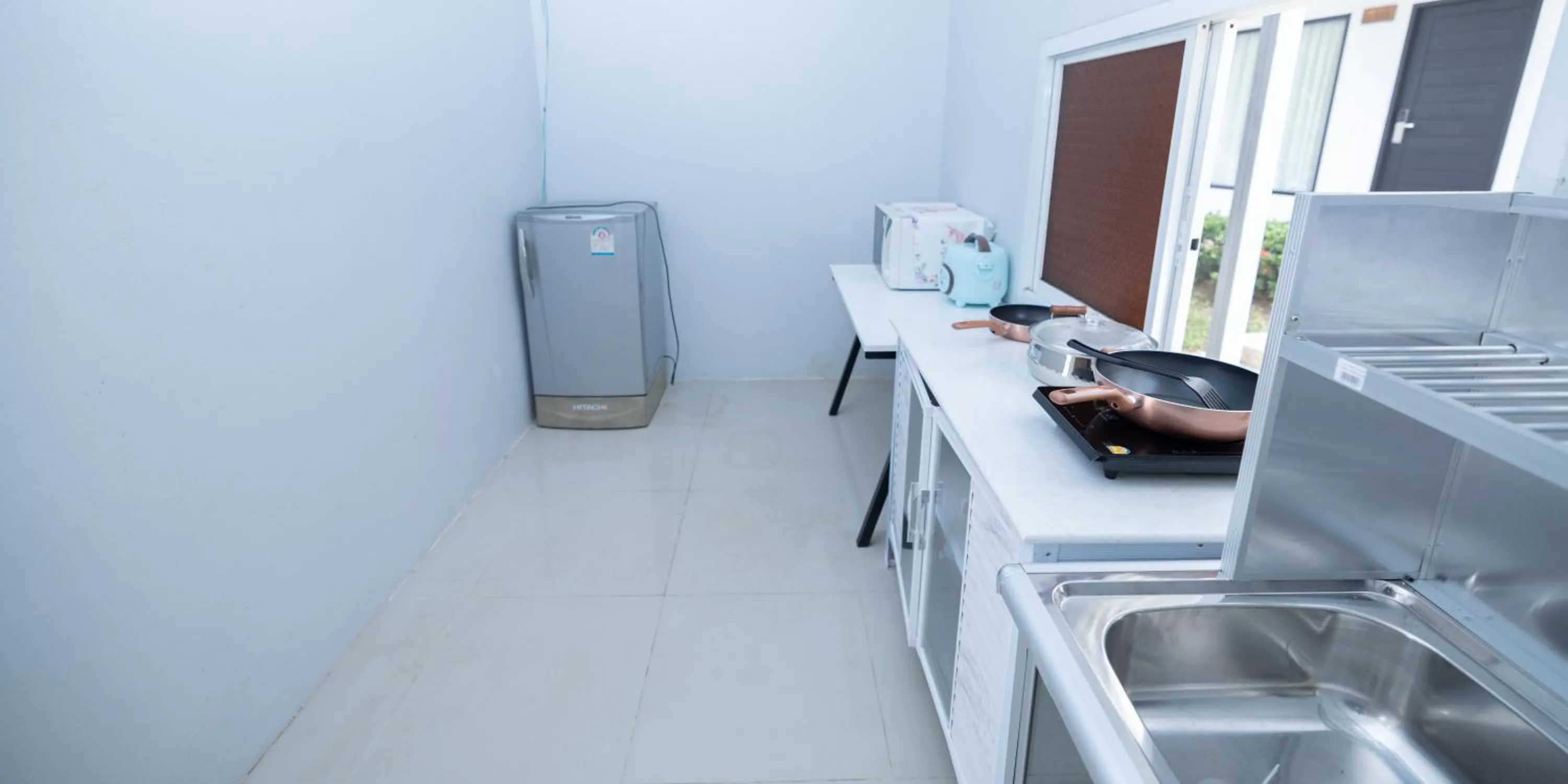 Communal kitchen in Blue Carina Hotel Phuket