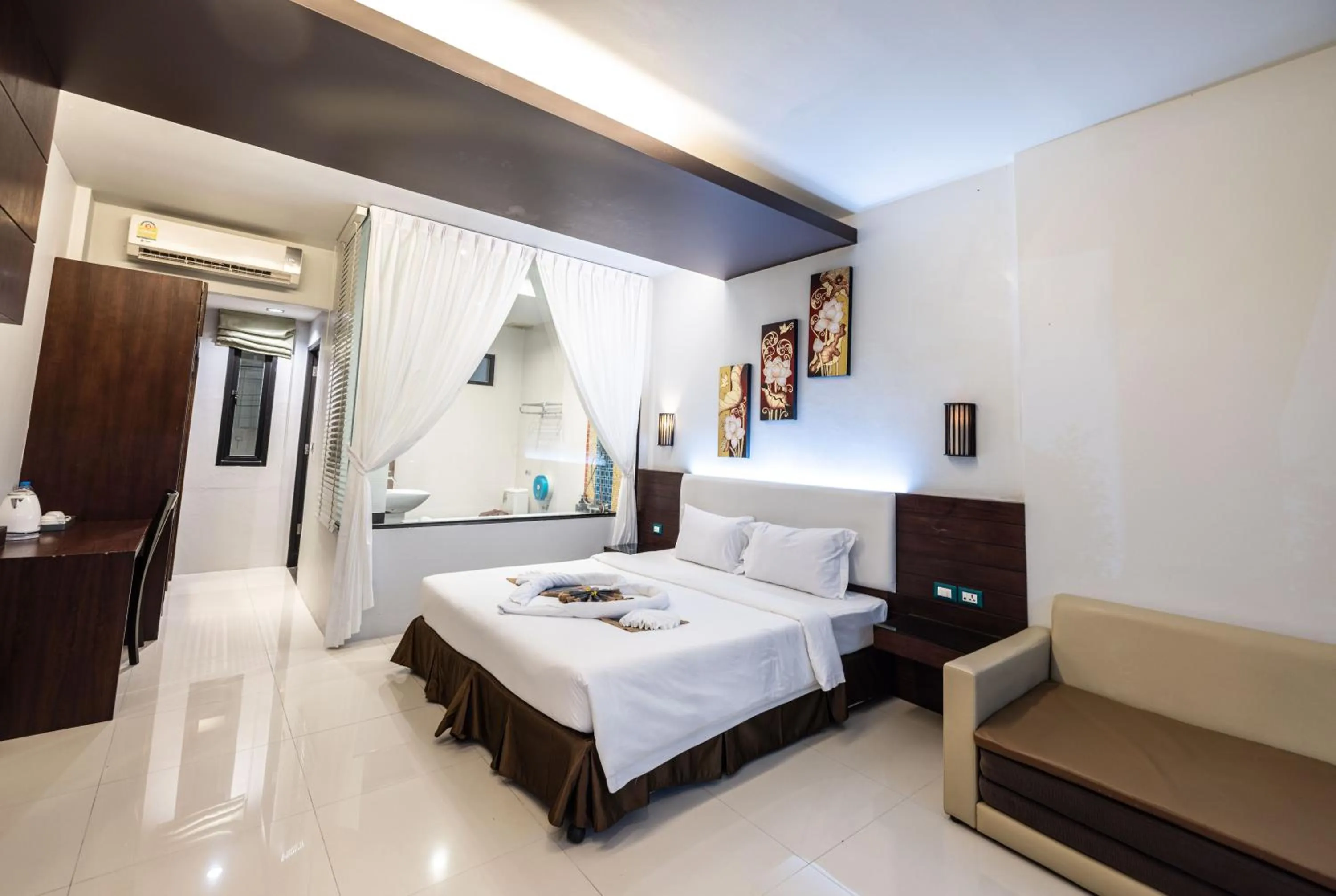 Living room, Bed in Blue Carina Hotel Phuket