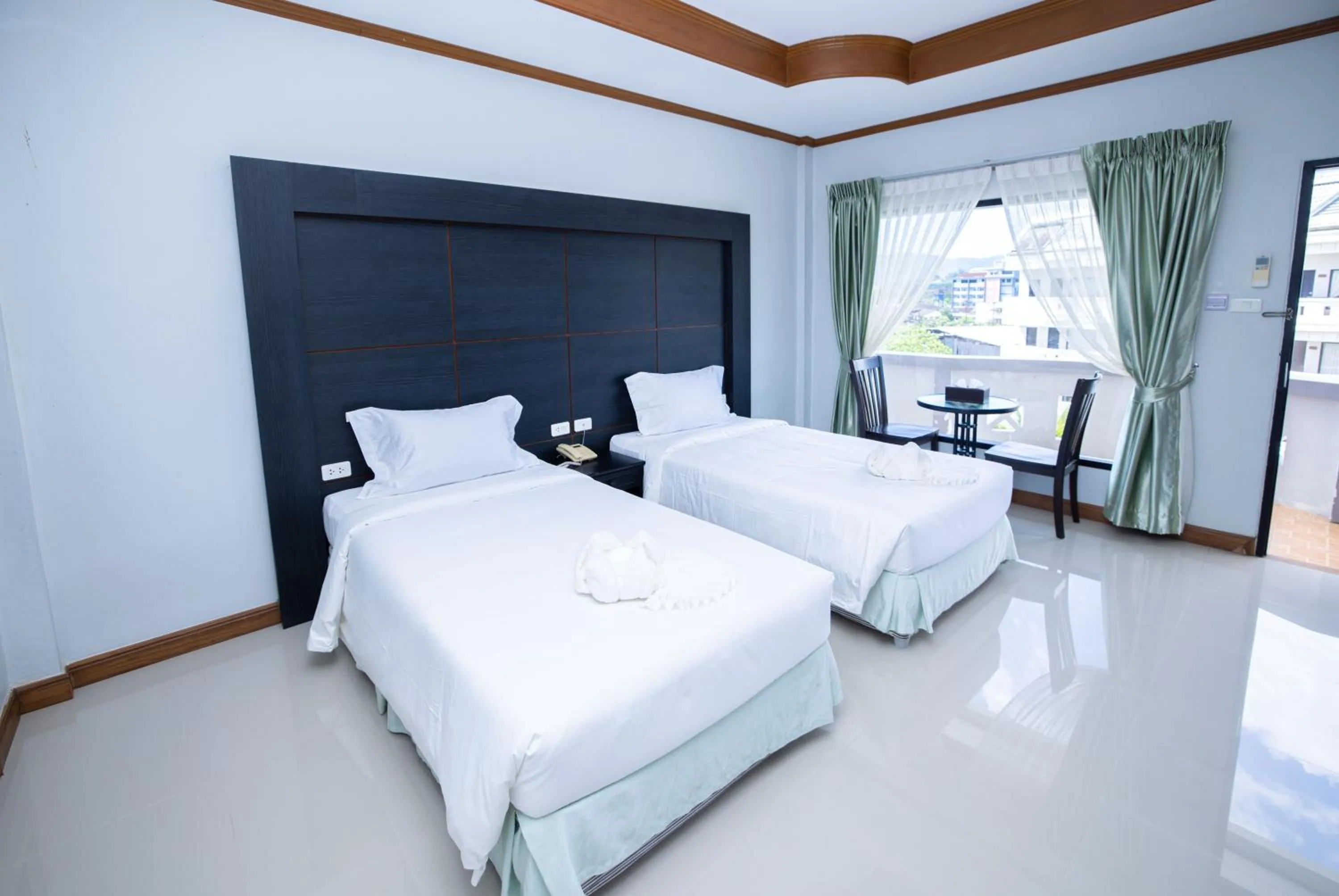 Photo of the whole room, Bed in Blue Carina Hotel Phuket