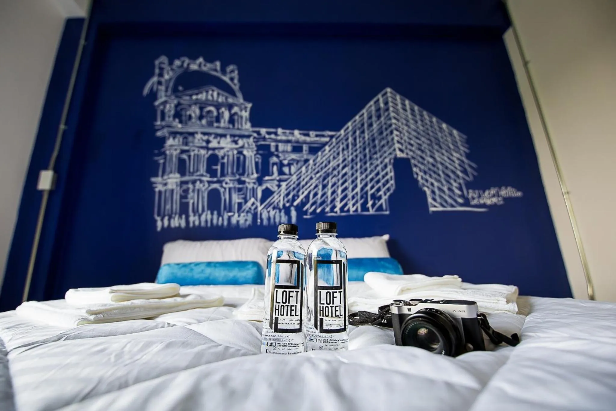 Bed in PJ Loft Hotel