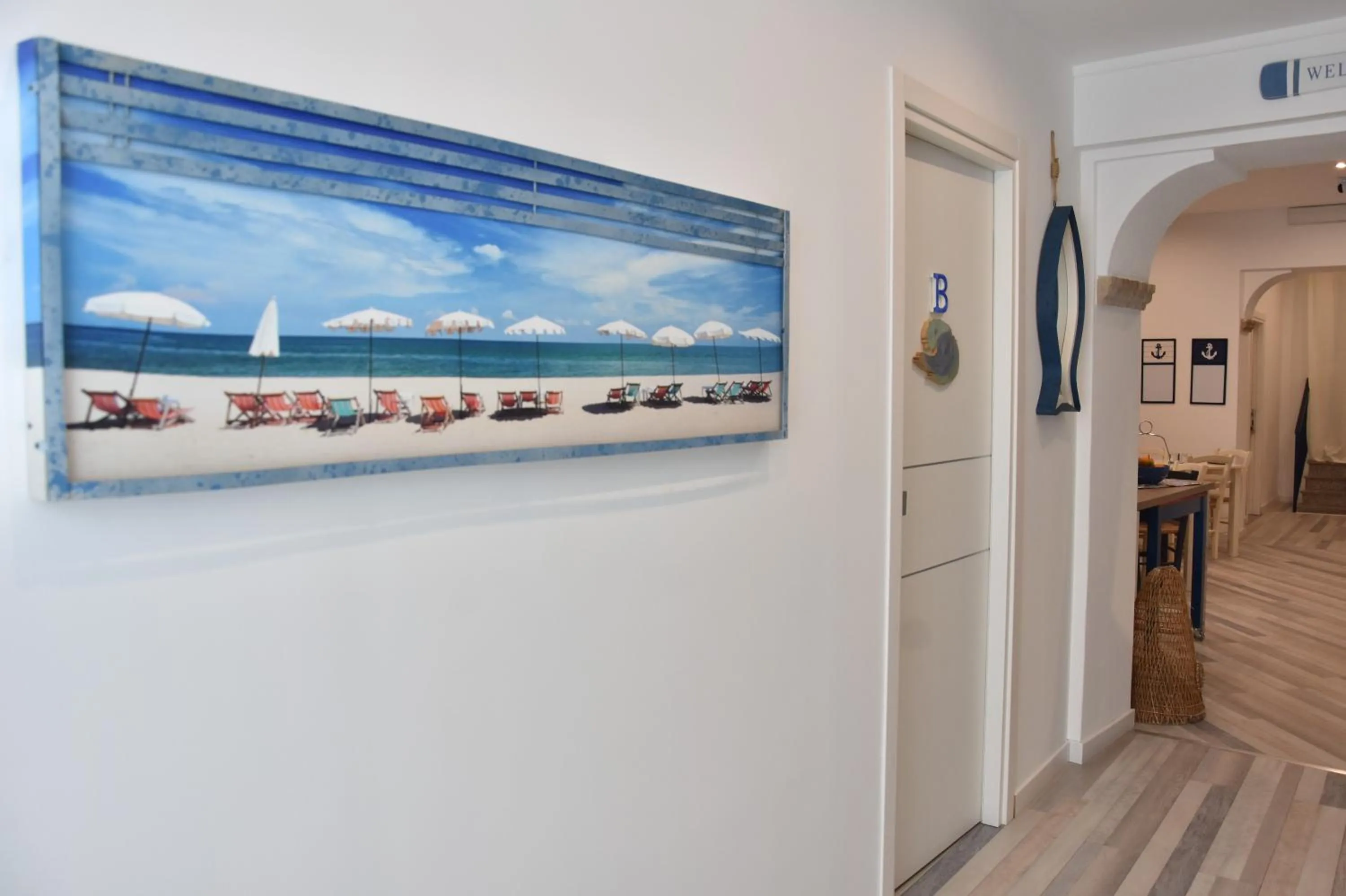 Communal lounge/ TV room in B&B Marina Blu