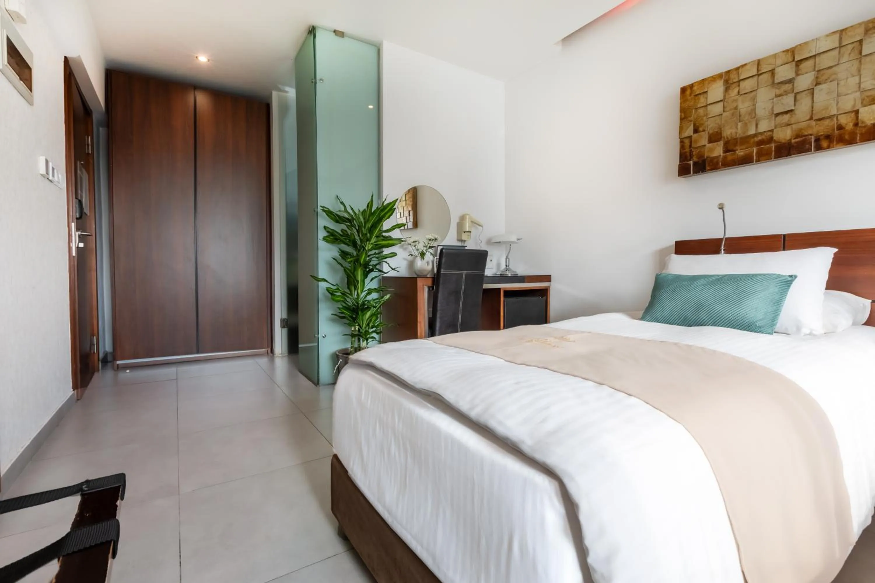 Bed in Achilleos City Hotel