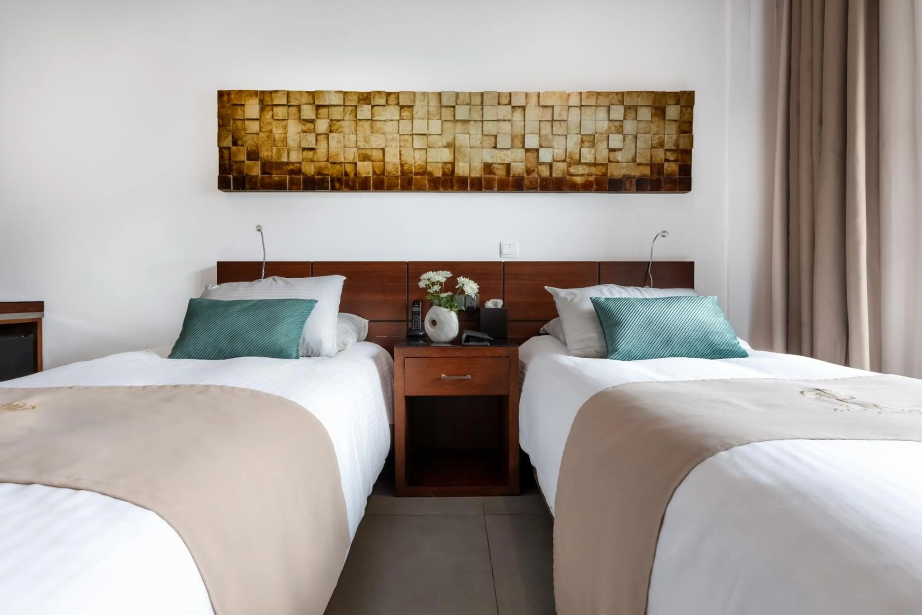 Bed in Achilleos City Hotel