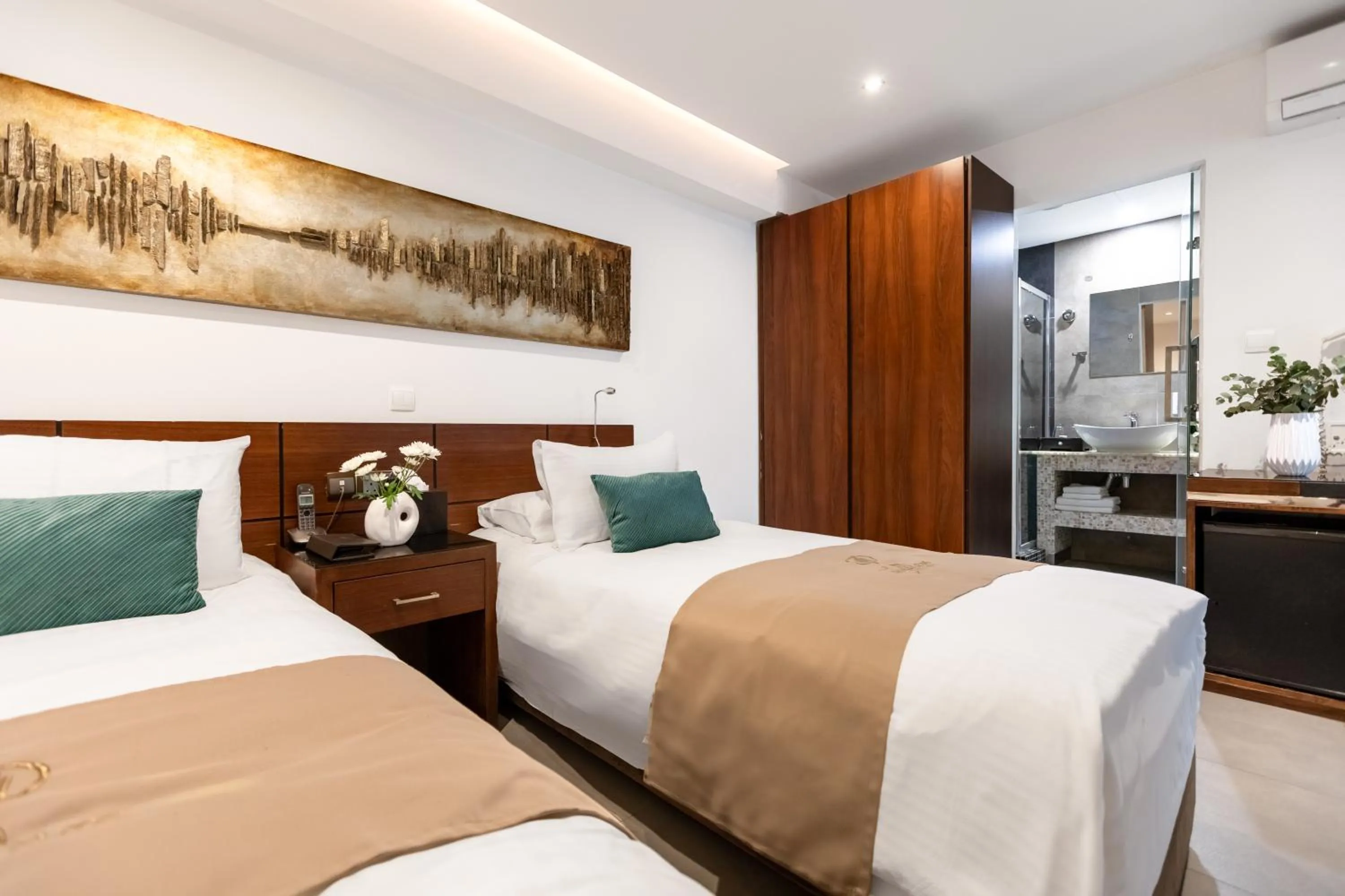 Bed in Achilleos City Hotel