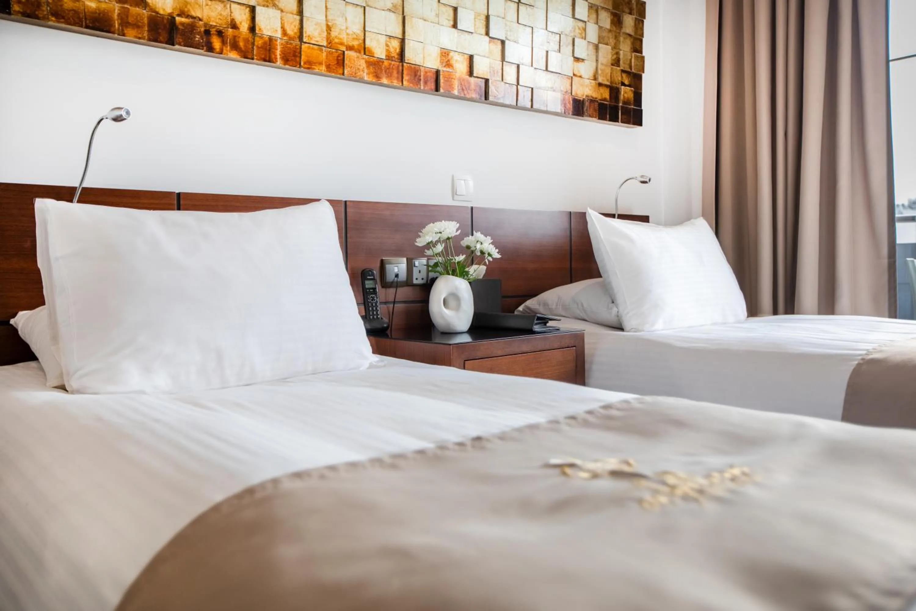 Bed in Achilleos City Hotel