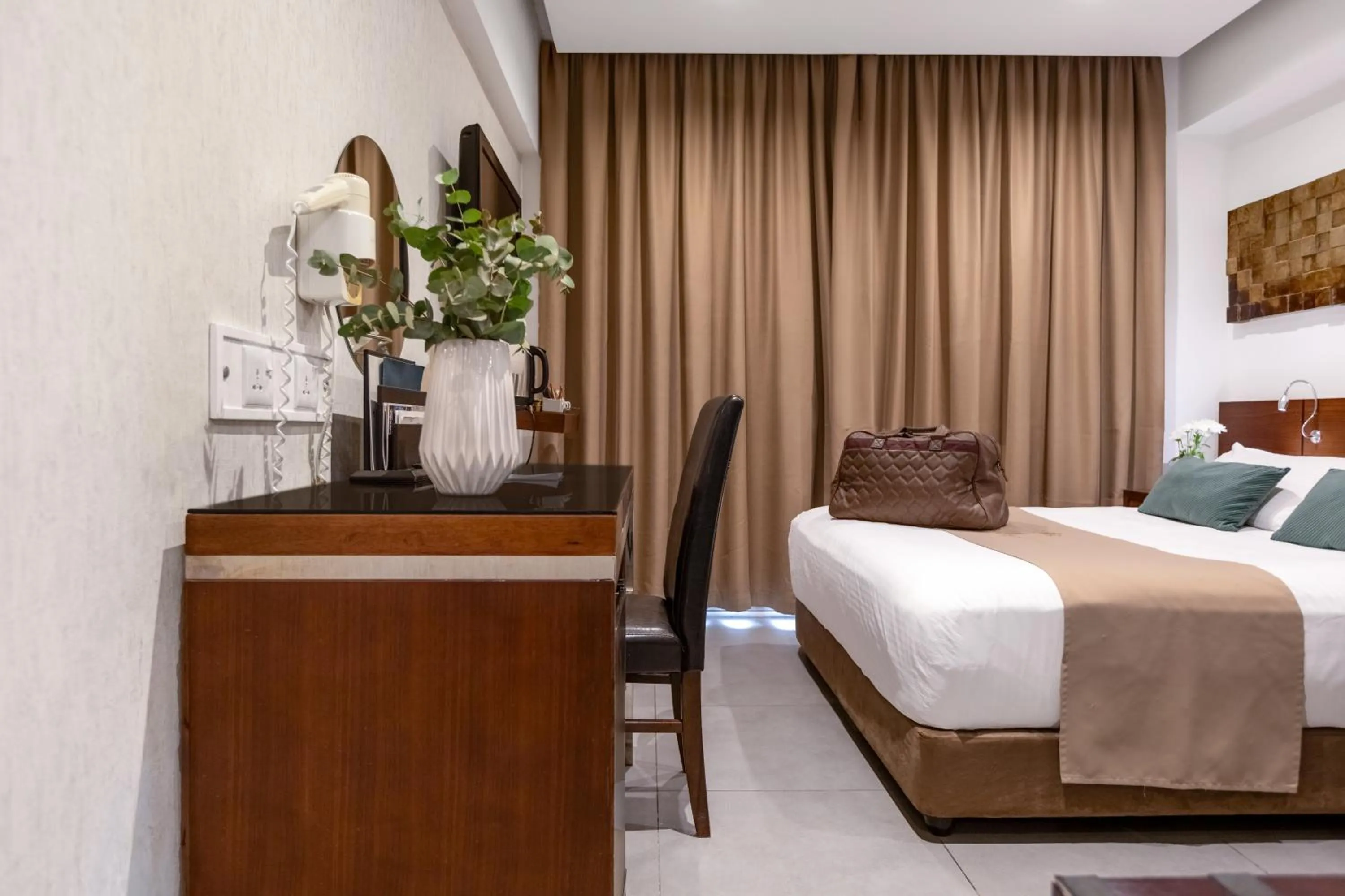 Bed in Achilleos City Hotel