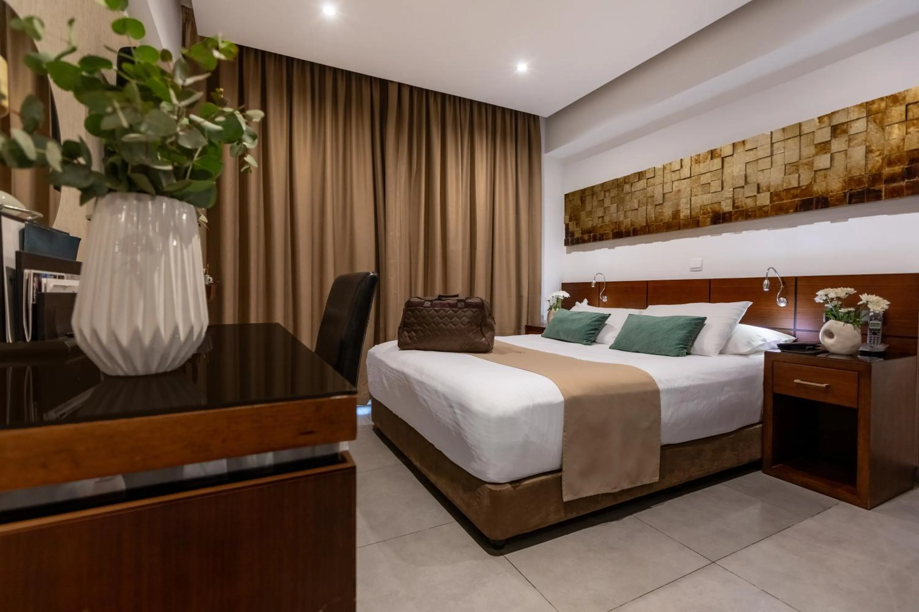 Bed in Achilleos City Hotel