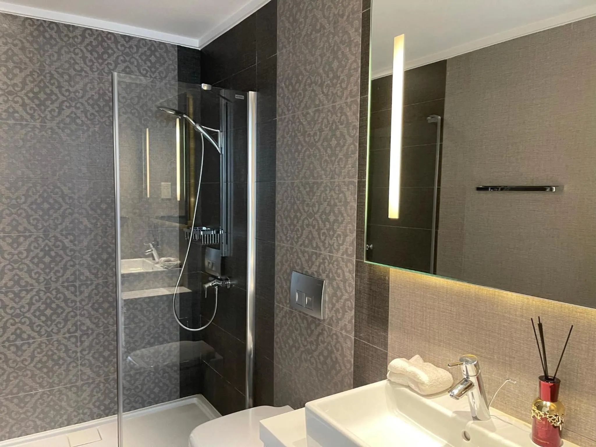 Shower in Olympic Residence Deluxe Apartments