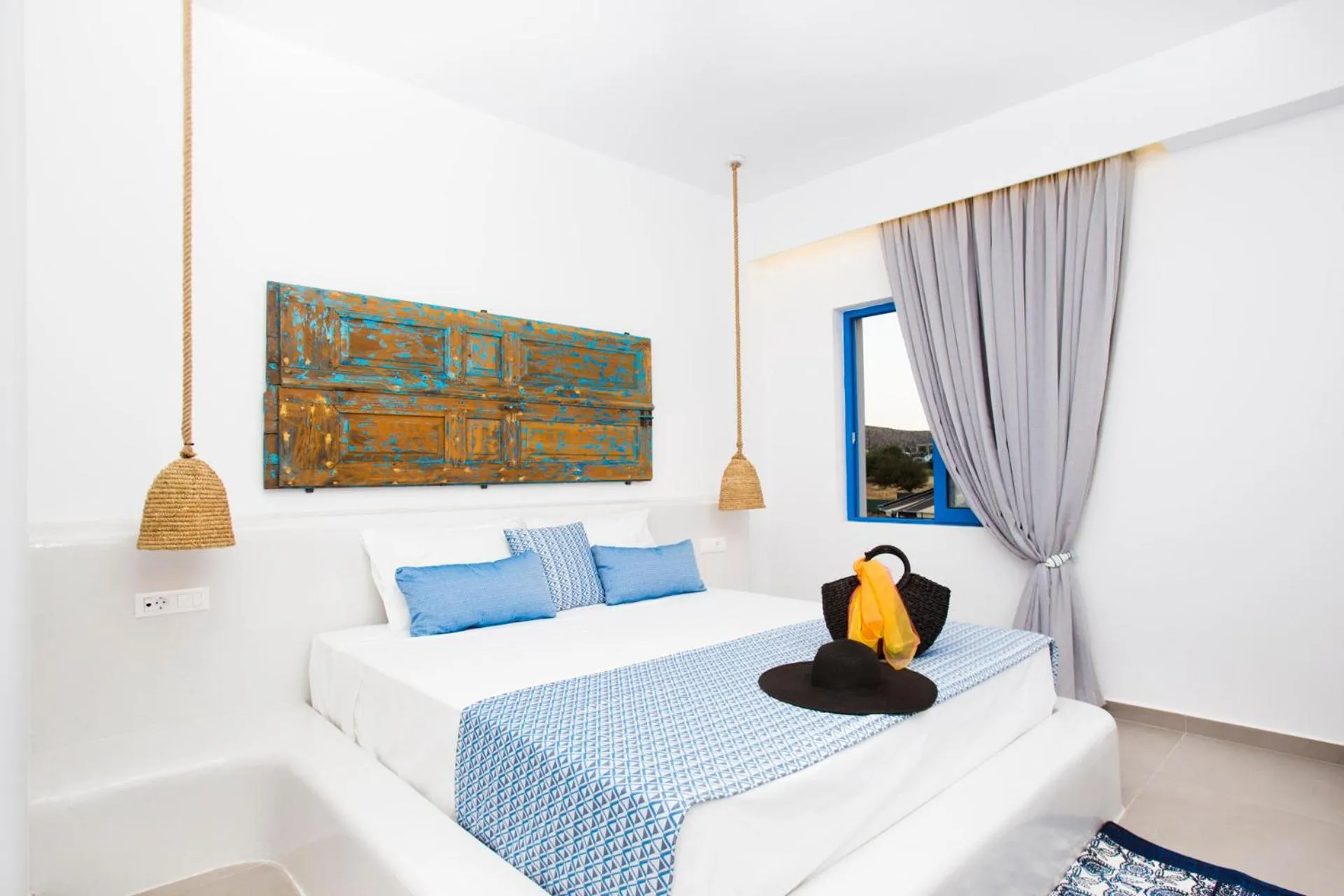 Bedroom, Bed in Lindos Portes Suites - Adults Only