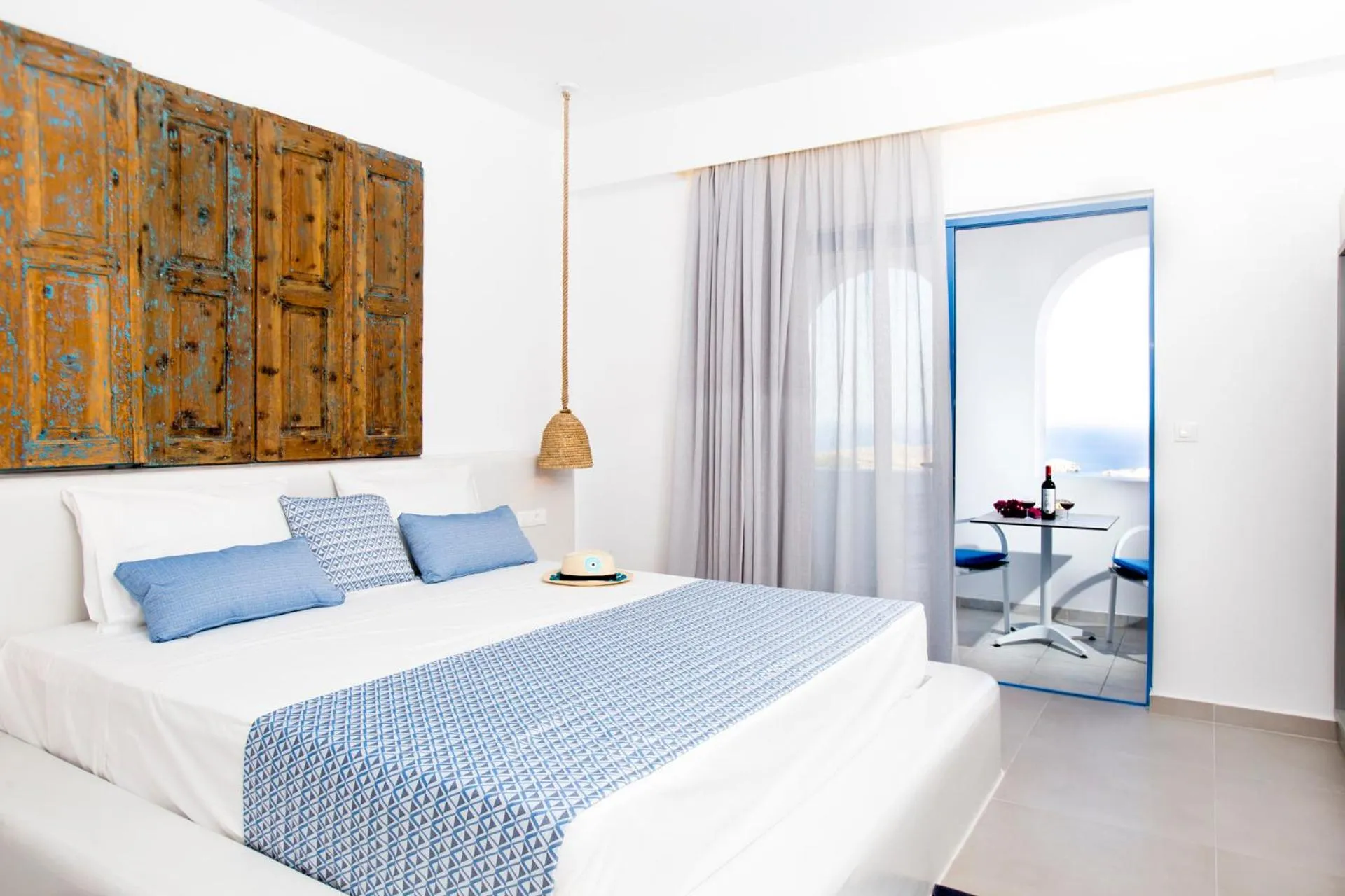 Photo of the whole room, Bed in Lindos Portes Suites - Adults Only