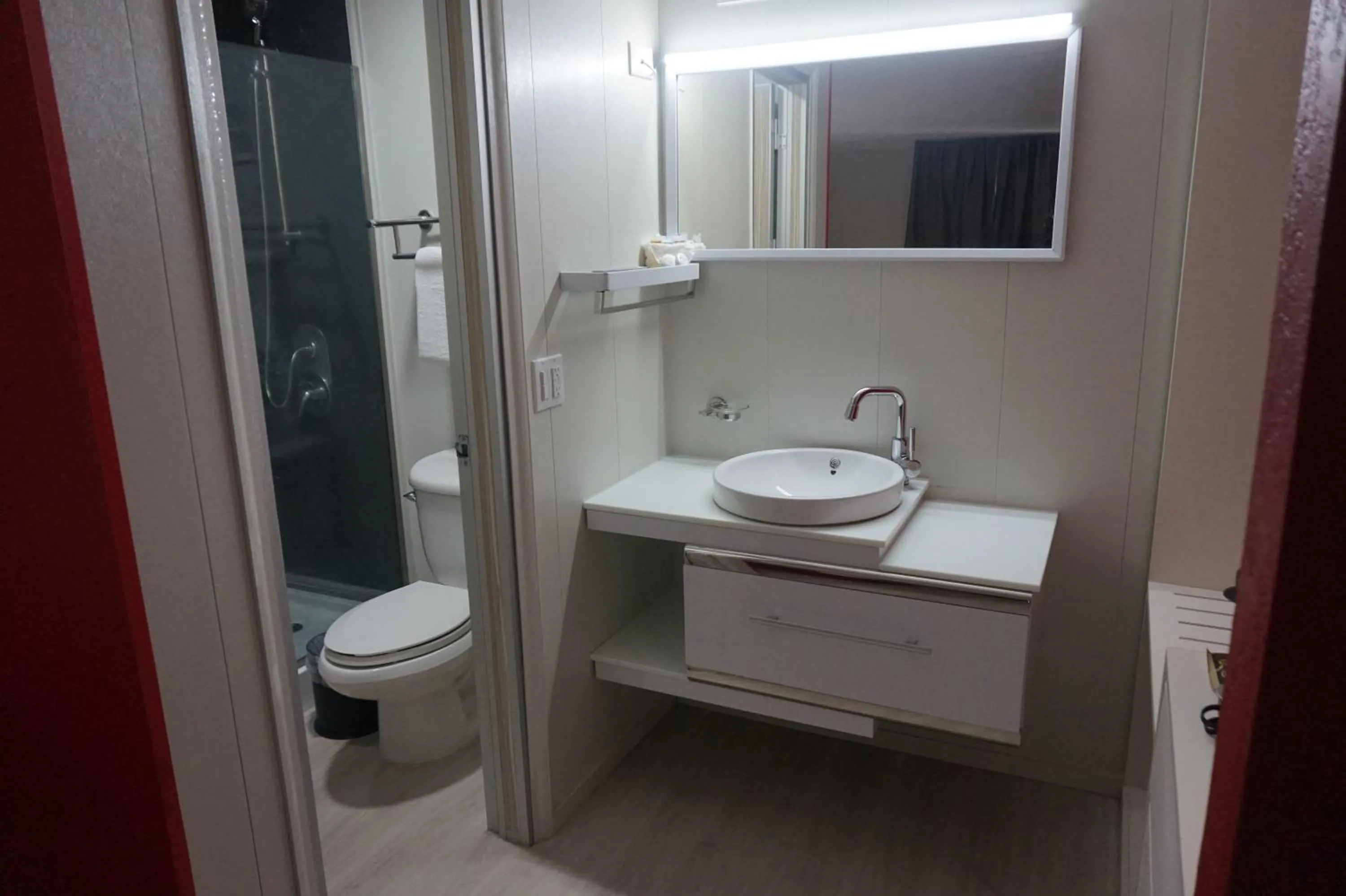 Bathroom in Travelodge by Wyndham Orlando at Heart of International Drive