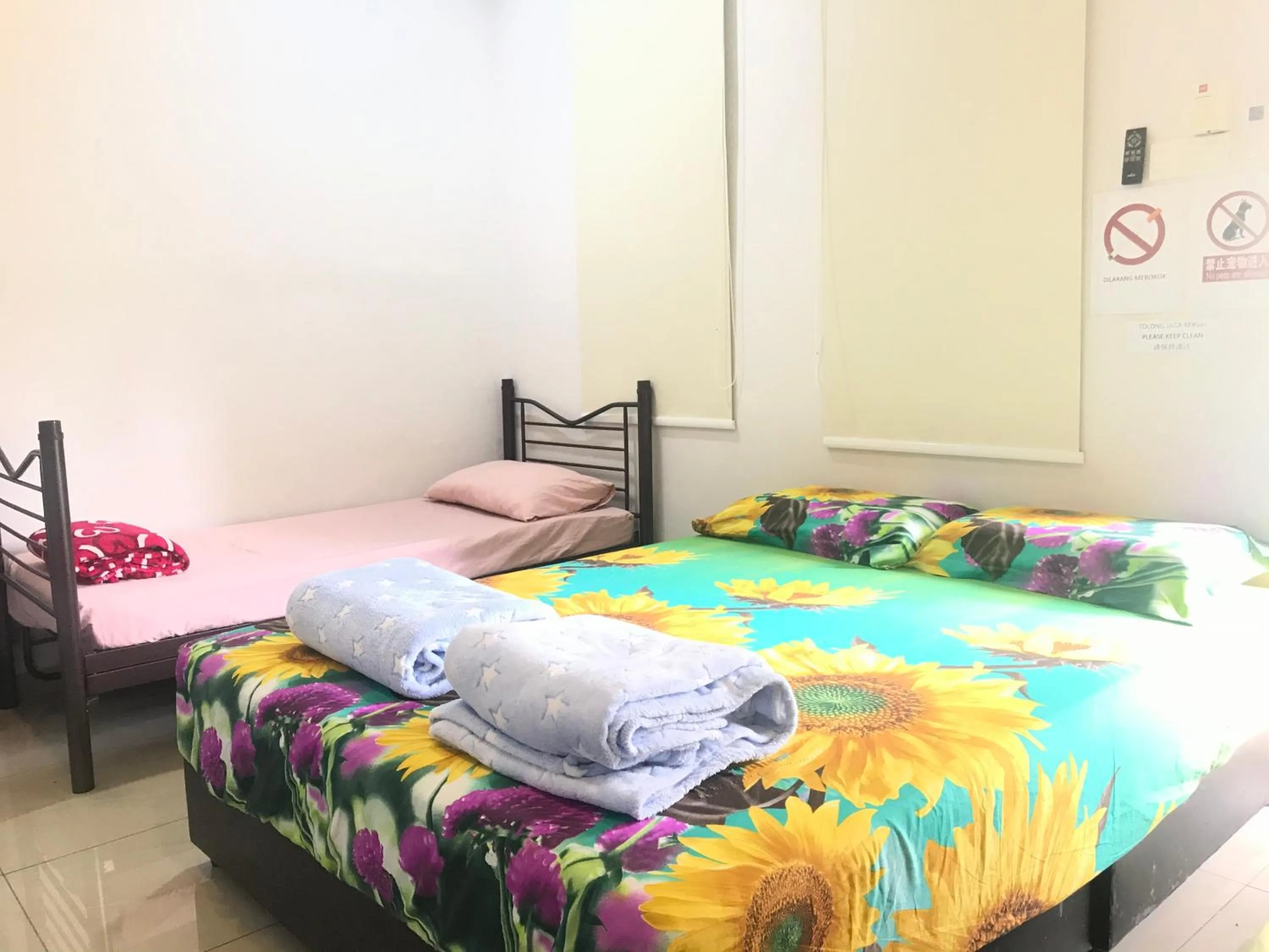 Bed in Jiaxin Homestay - JP Pedana 家馨民宿