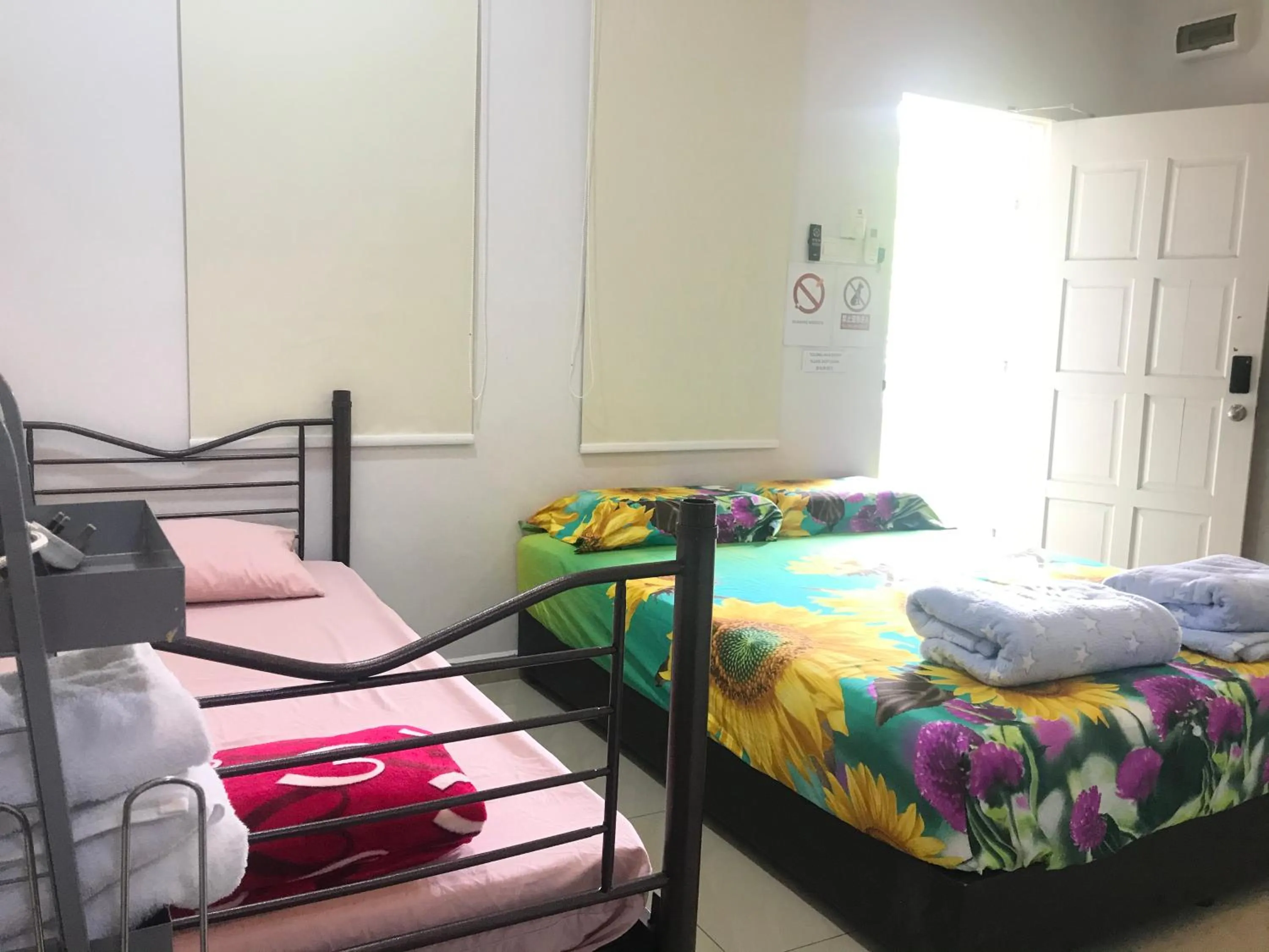 Bed in Jiaxin Homestay - JP Pedana 家馨民宿