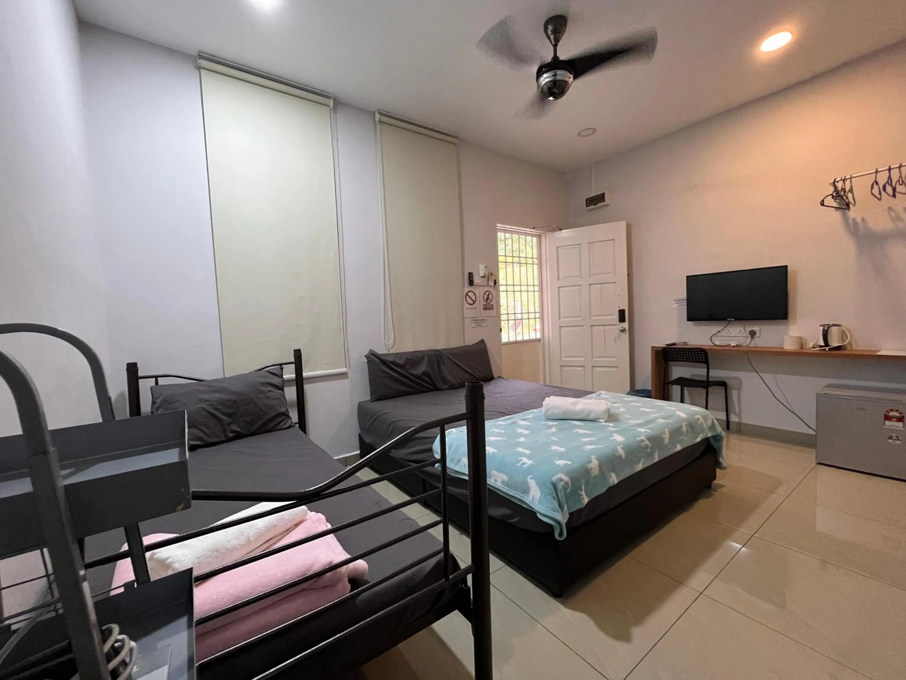 Bed in Jiaxin Homestay - JP Pedana 家馨民宿