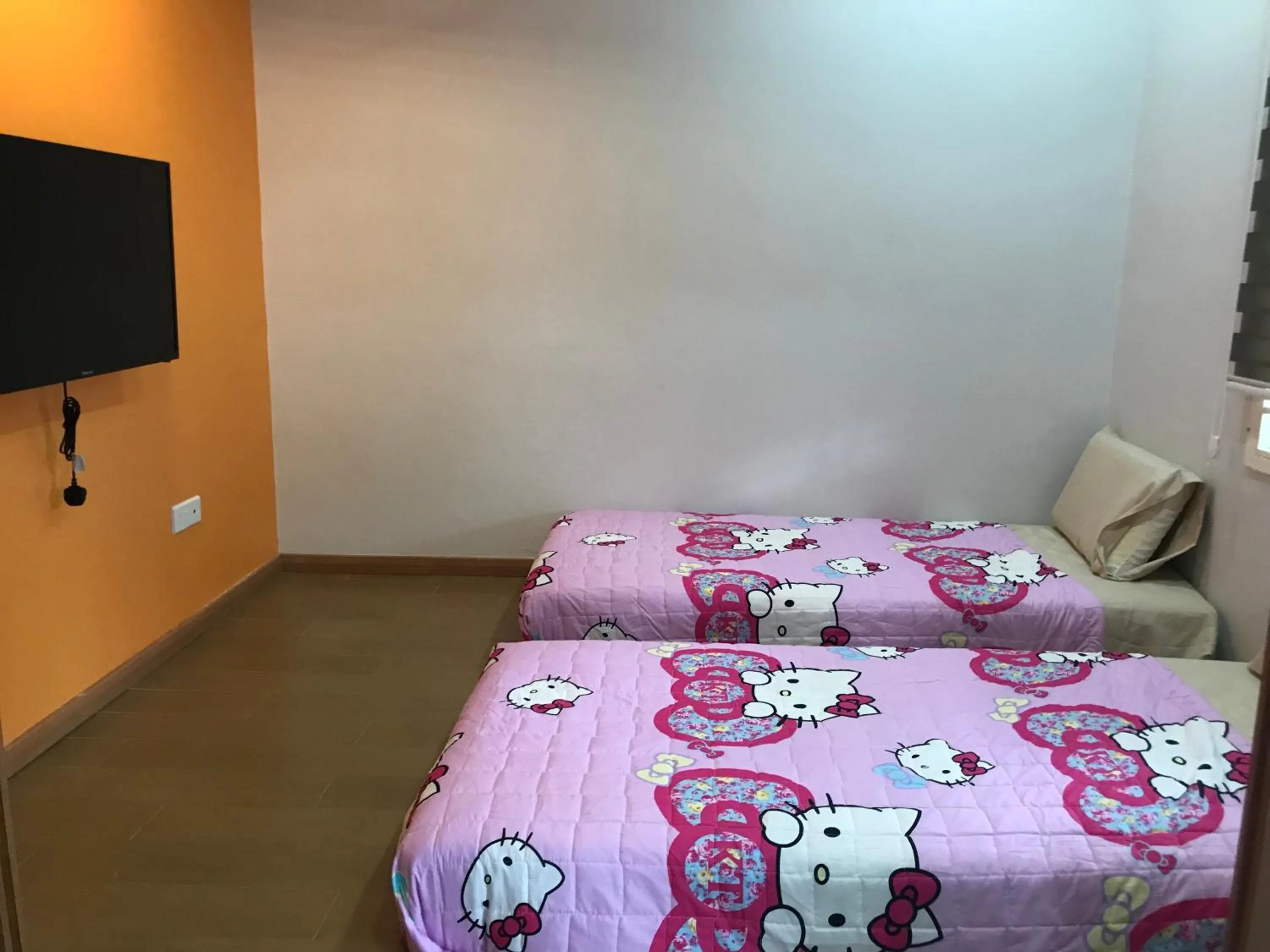 Bed in Jiaxin Homestay - JP Pedana 家馨民宿