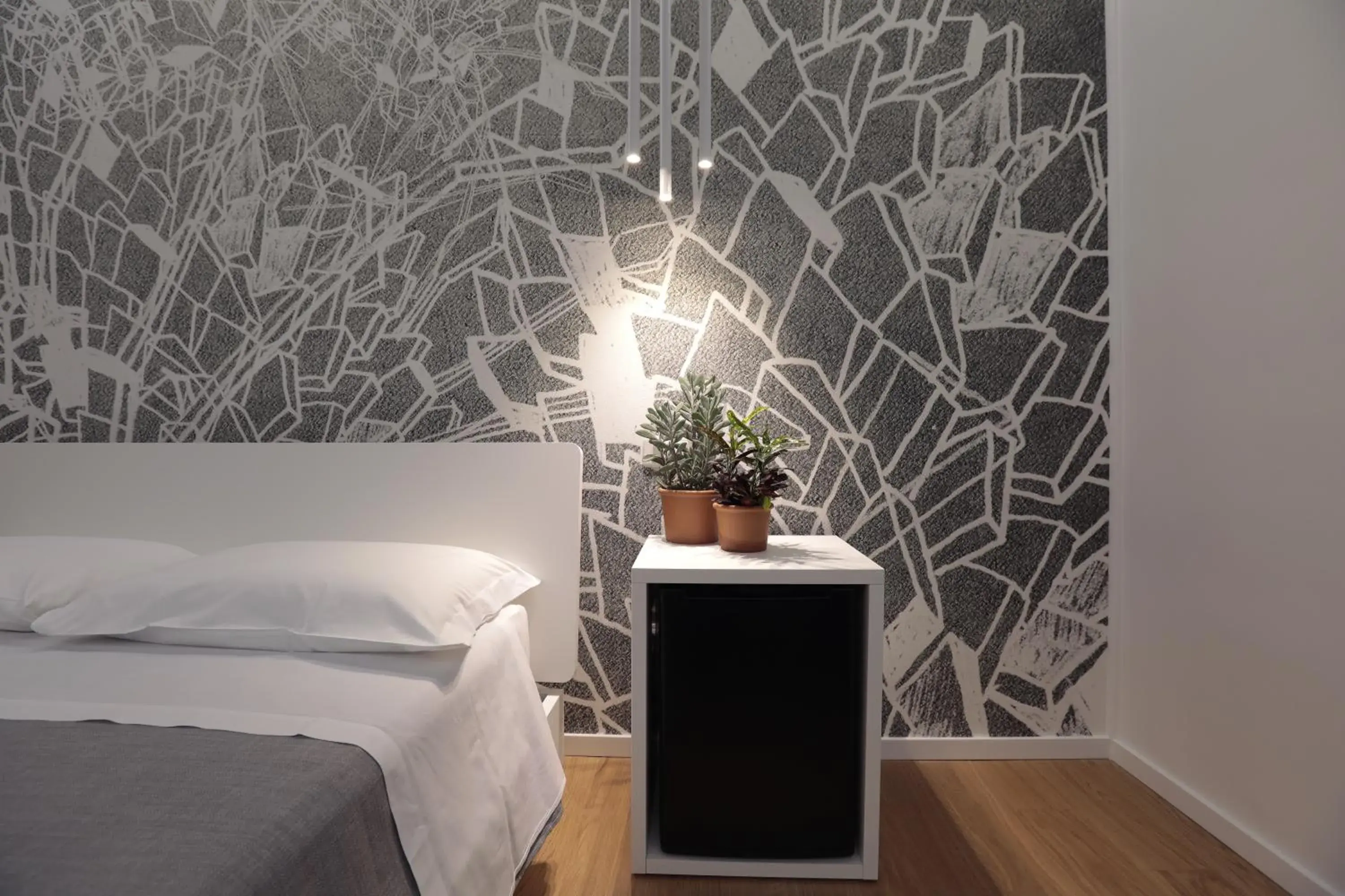 Deluxe Quadruple Room in Suite Inn Rome Deluxe Quadruple Room in Suite Inn Rome