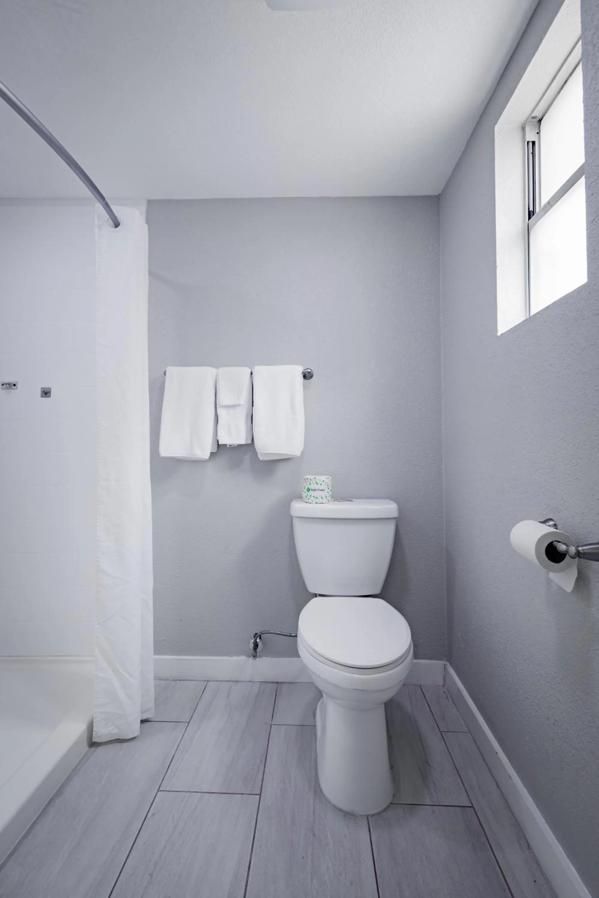 Toilet in Welcome Inn