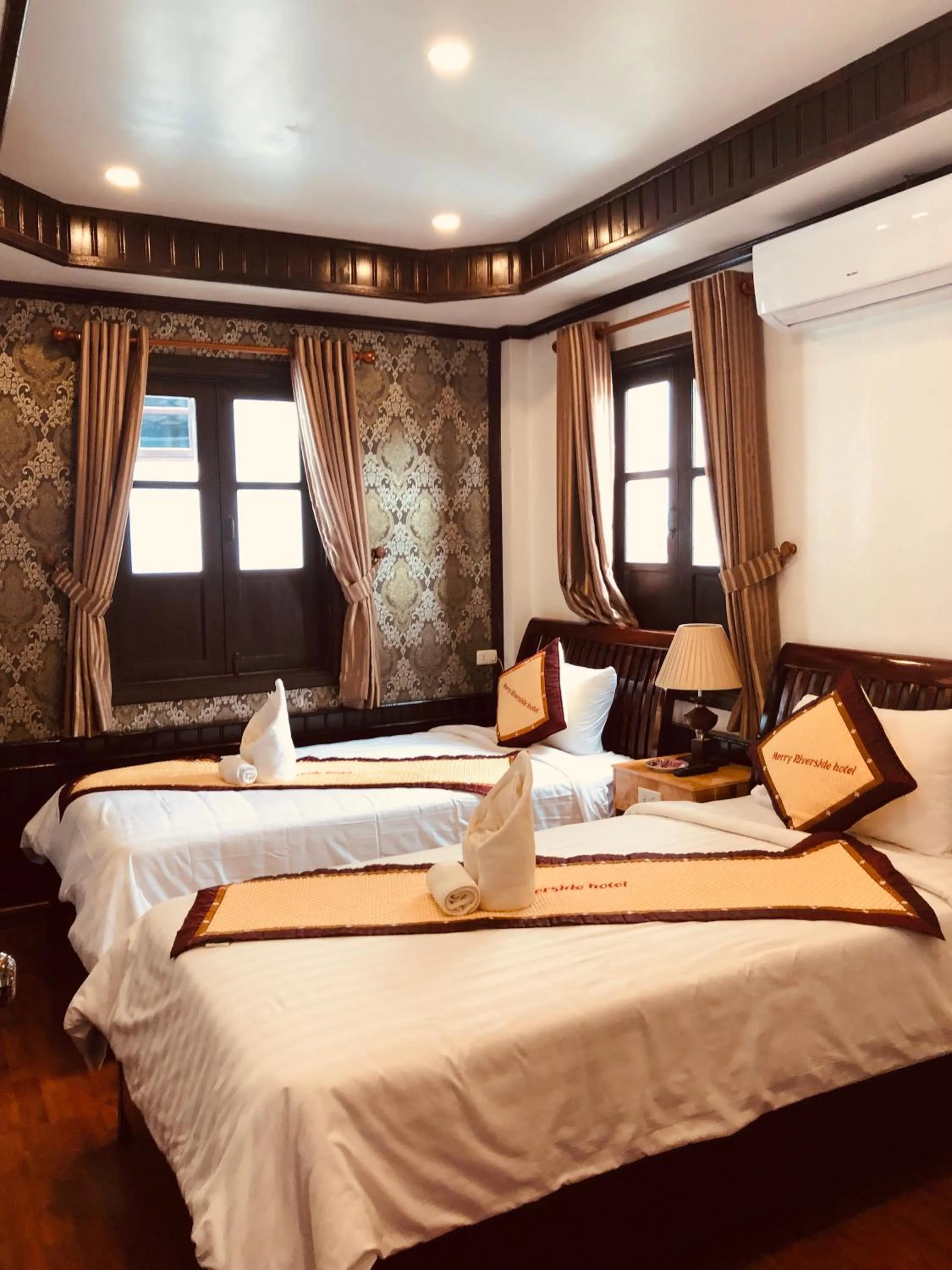 Bedroom, Bed in Merry Riverside Hotel