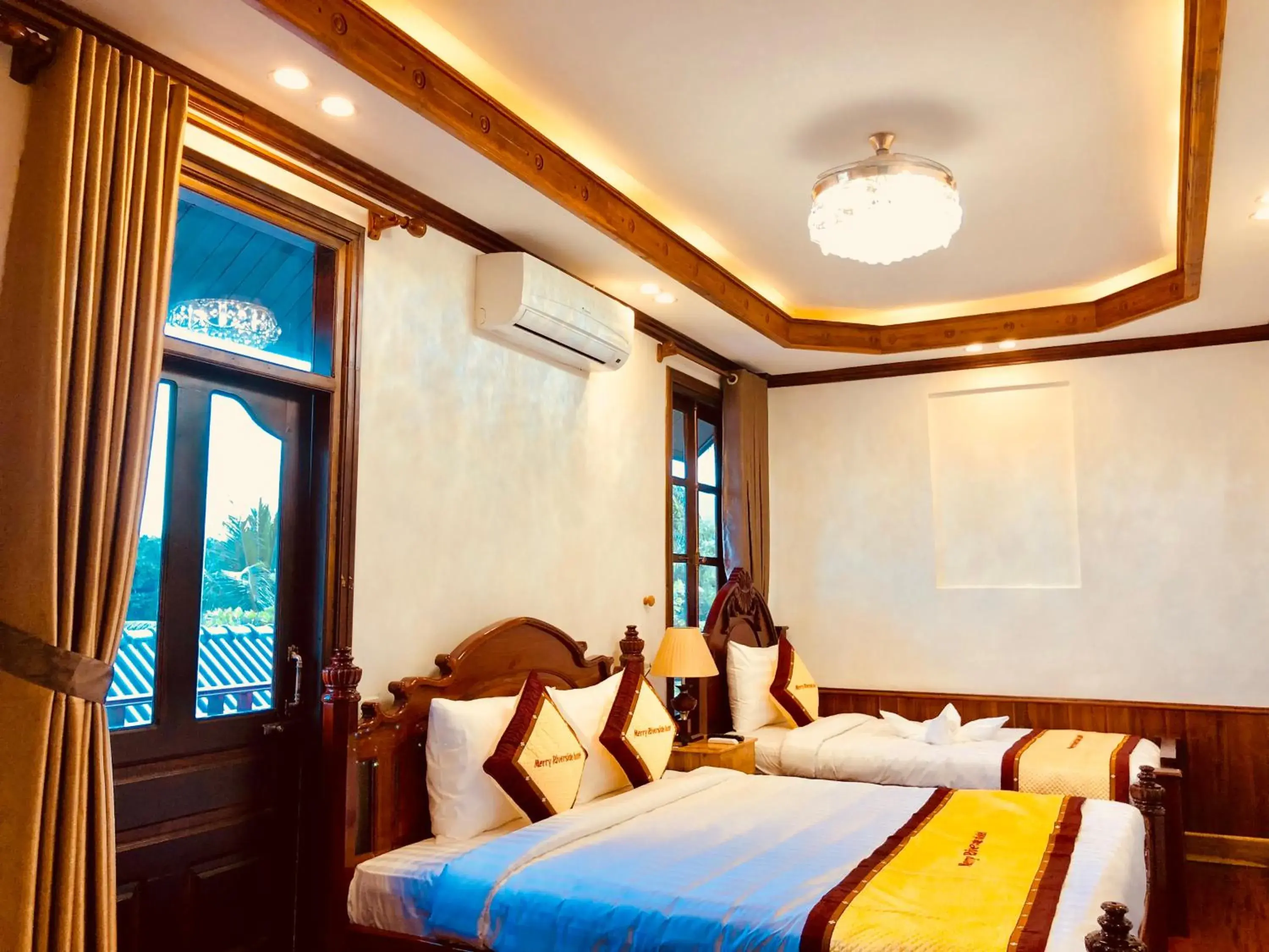 Family Two-Bedroom Suite with River View in Merry Riverside Hotel Family Two-Bedroom Suite with River View in Merry Riverside Hotel