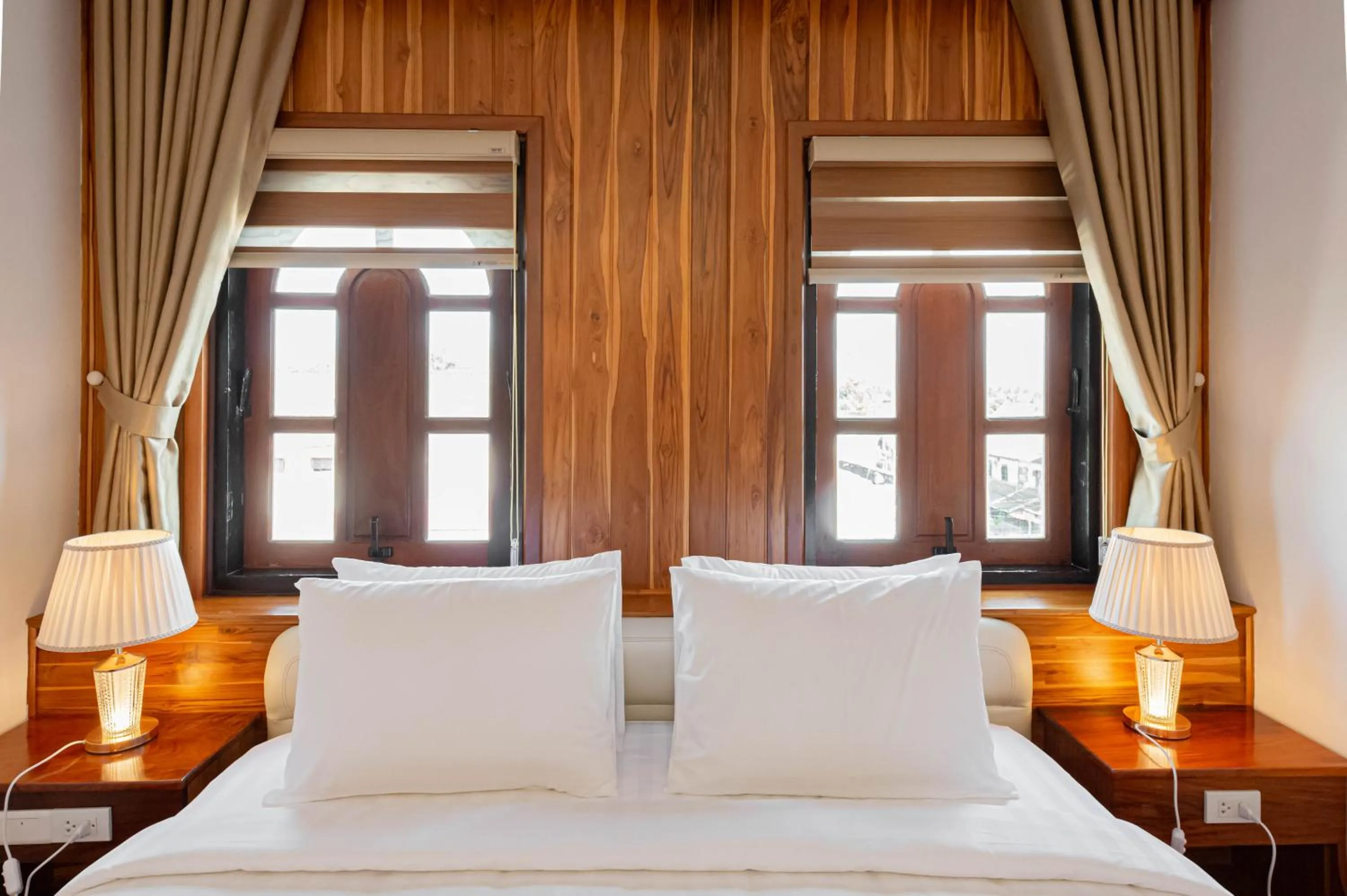 Bed in Merry Riverside Hotel