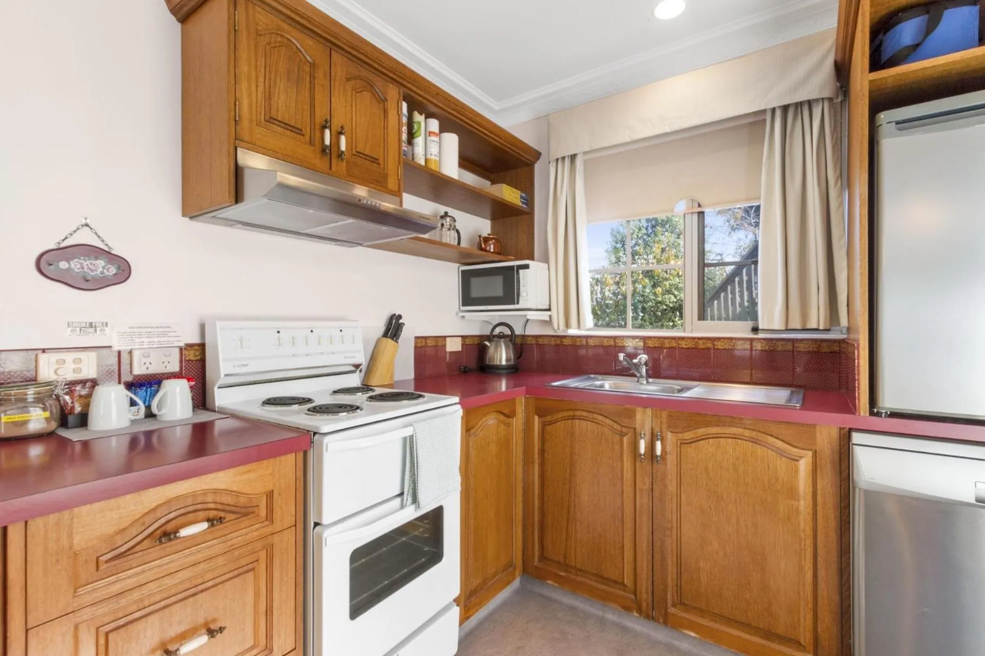 Kitchen or kitchenette in Swansea Cottages & Lodge Suites
