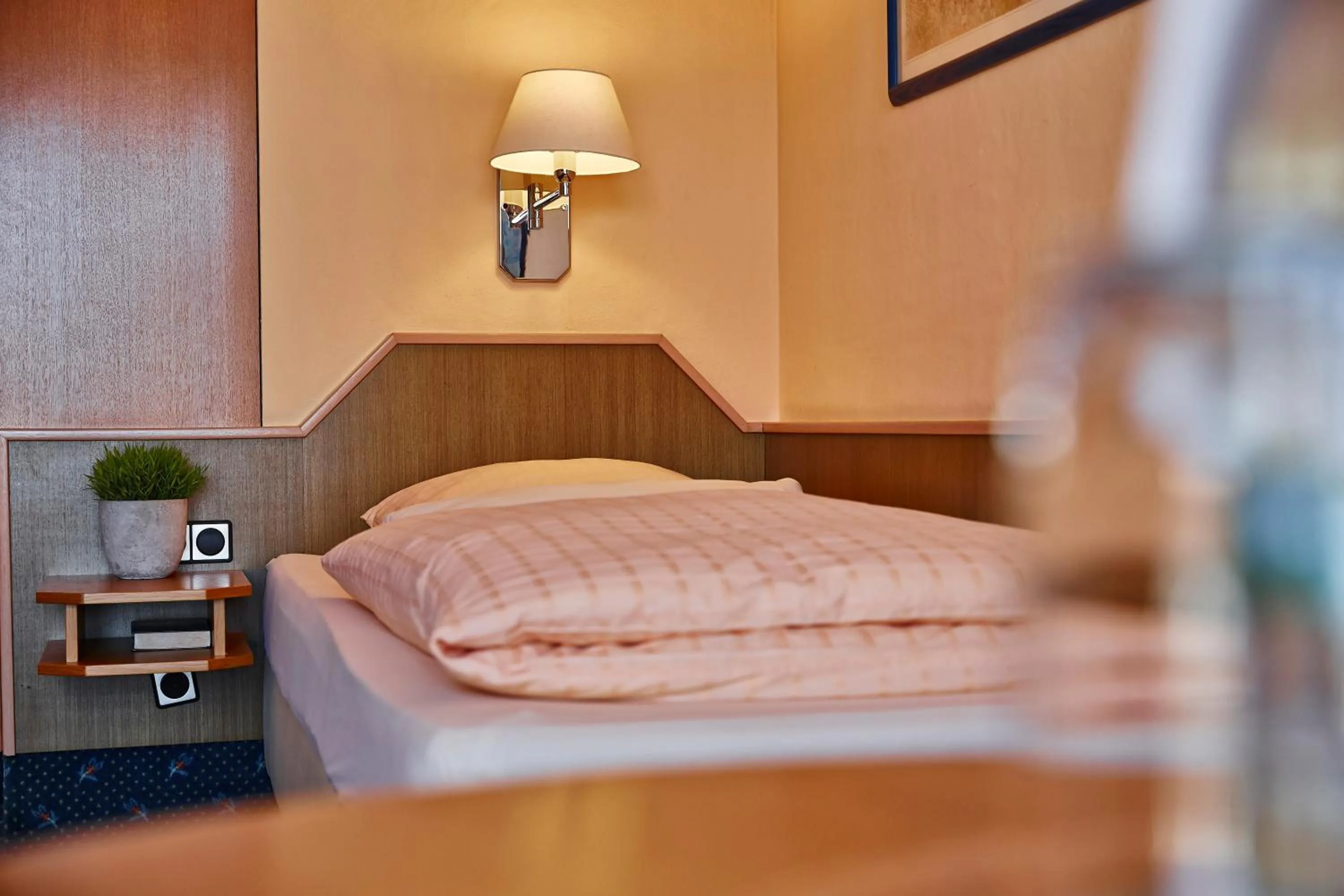 Bed in Hotel Bommersheim