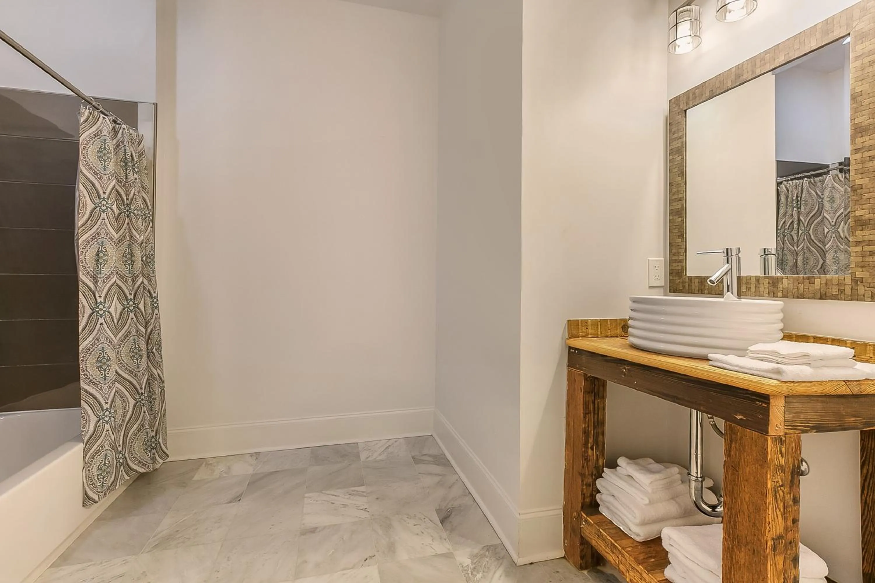 Bathroom in Spacious Loft-Style 3BR Townhouse by Hosteeva