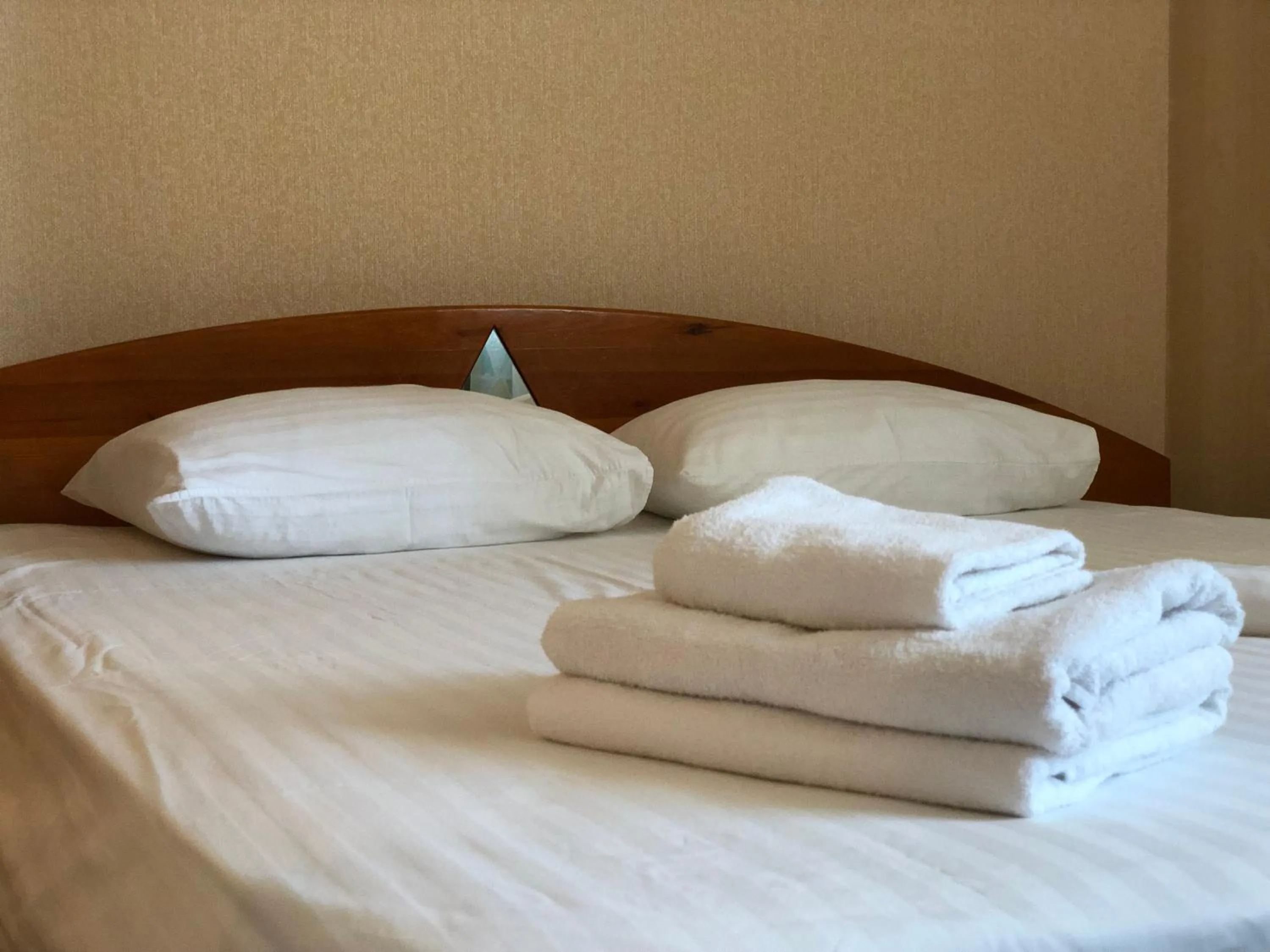 Bed in Zhuliany City Hotel