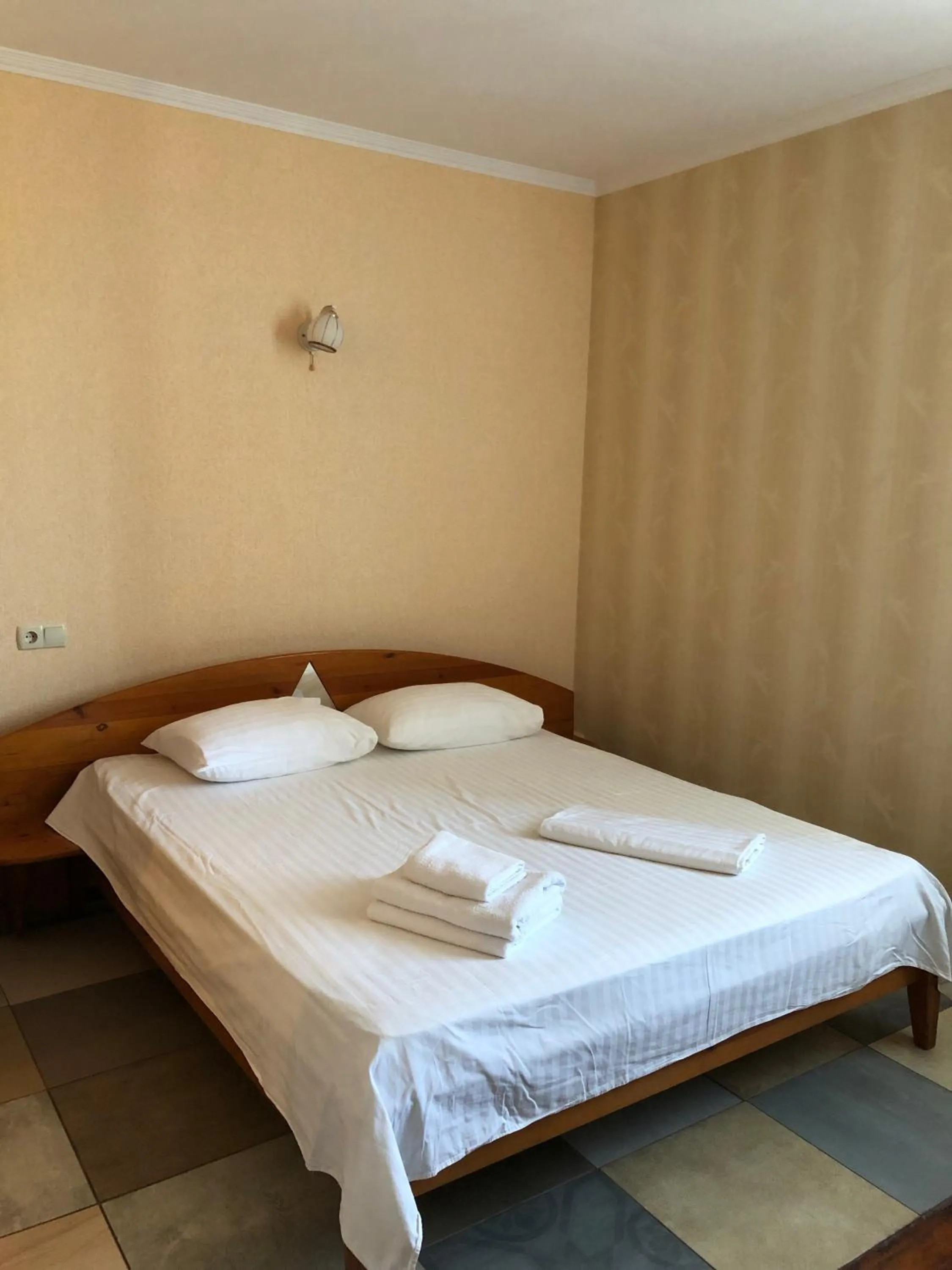 Bed in Zhuliany City Hotel