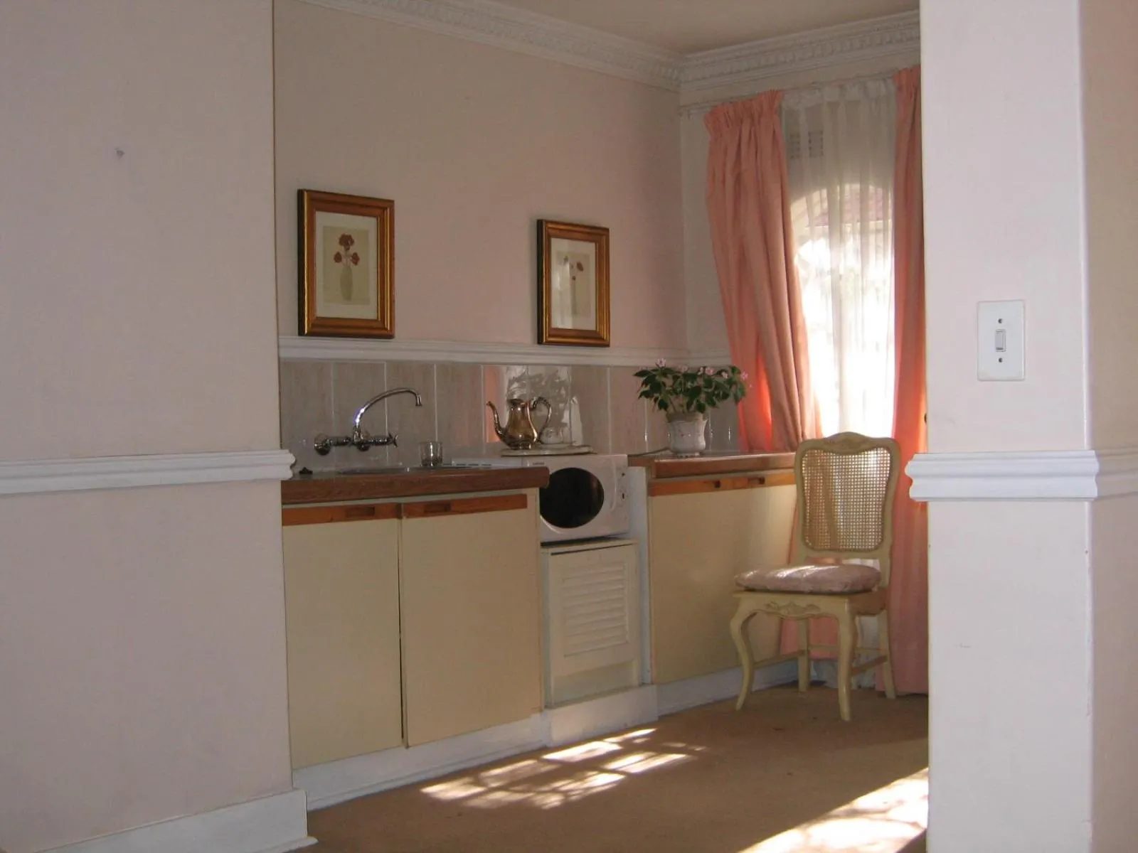 Kitchen or kitchenette in Villa Victoria executive Guest House