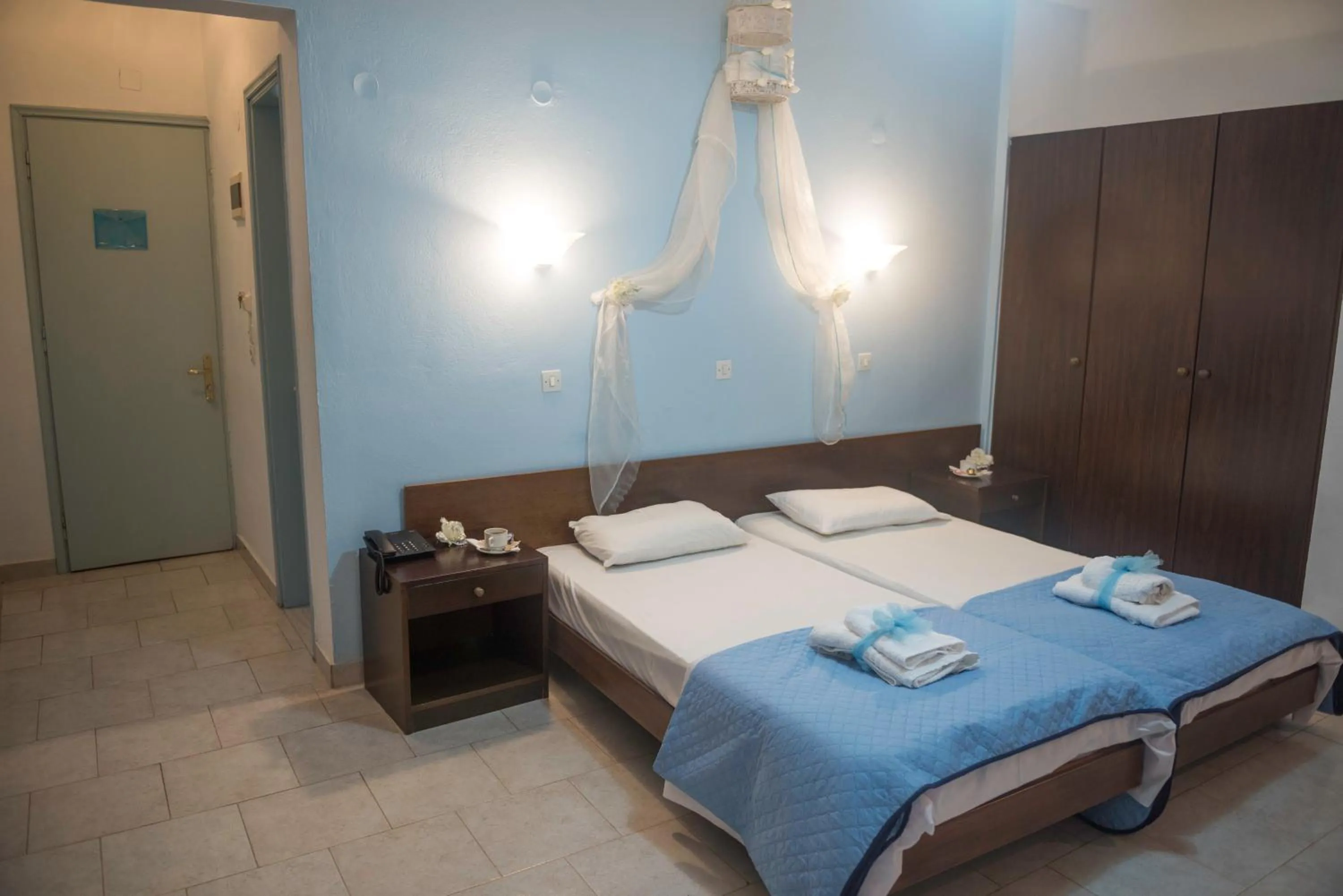 Bed in Antonios Hotel