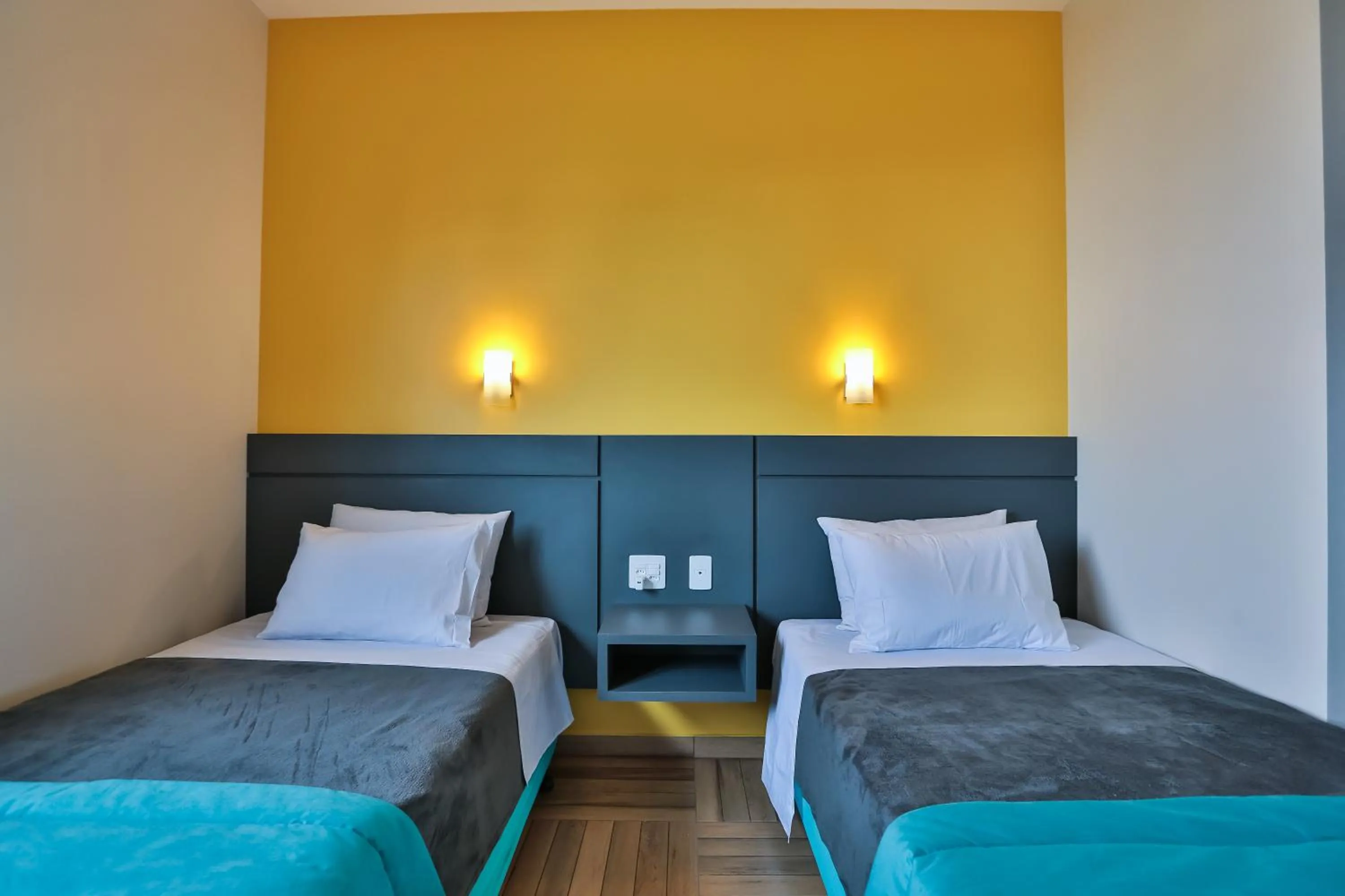 Bed in Sleep Inn São Carlos