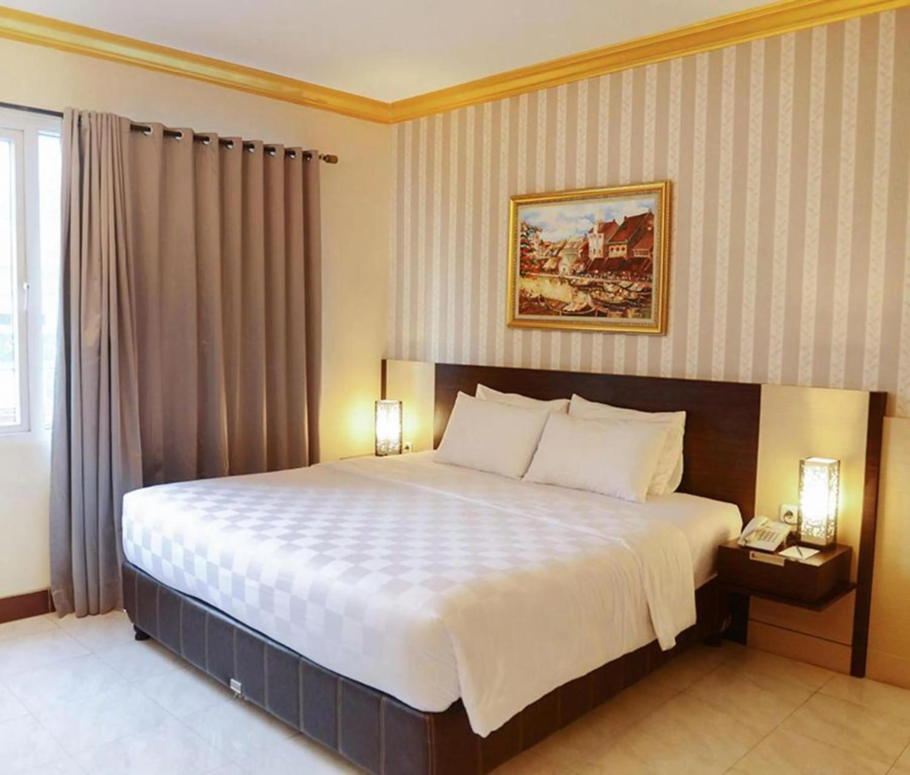 Bed in Hotel 88 Jember By WH - Strategic Location In The City Center
