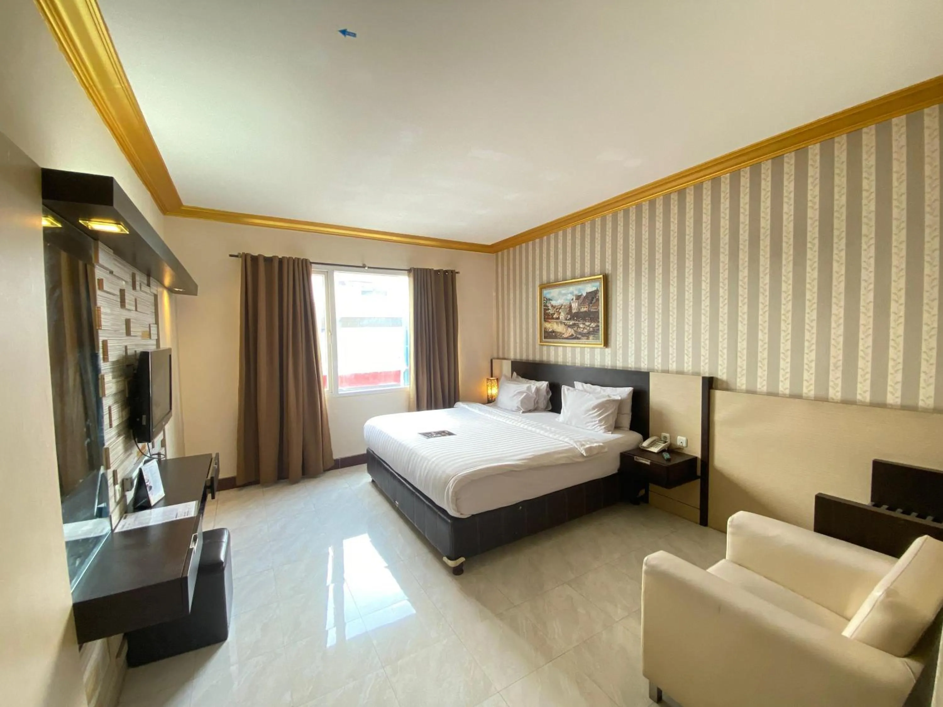 Bedroom, Bed in Hotel 88 Jember By WH - Strategic Location In The City Center