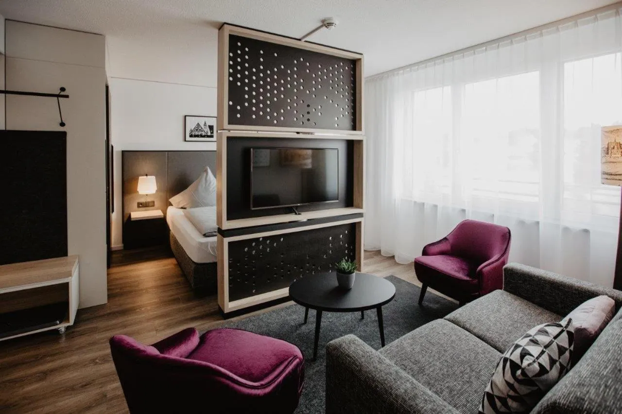 Communal lounge/ TV room in Arivo Forchheim